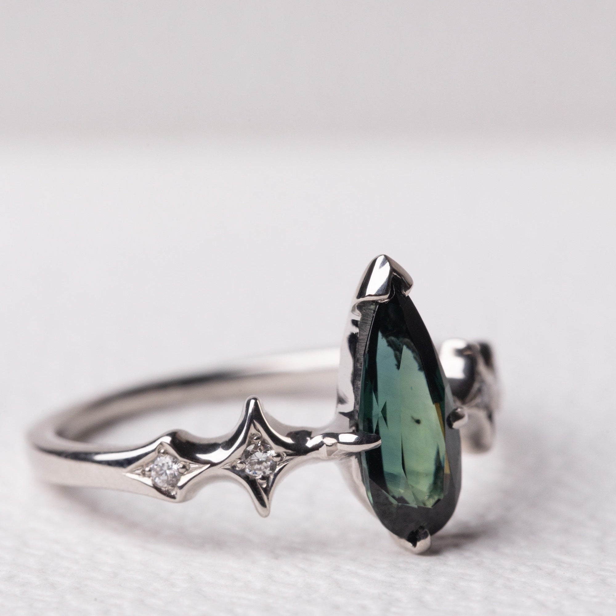 1.36ct Pear Brilliant Sapphire <br><b> Sylvie </b>| Elongated Sapphire Ring with Stardust Accents