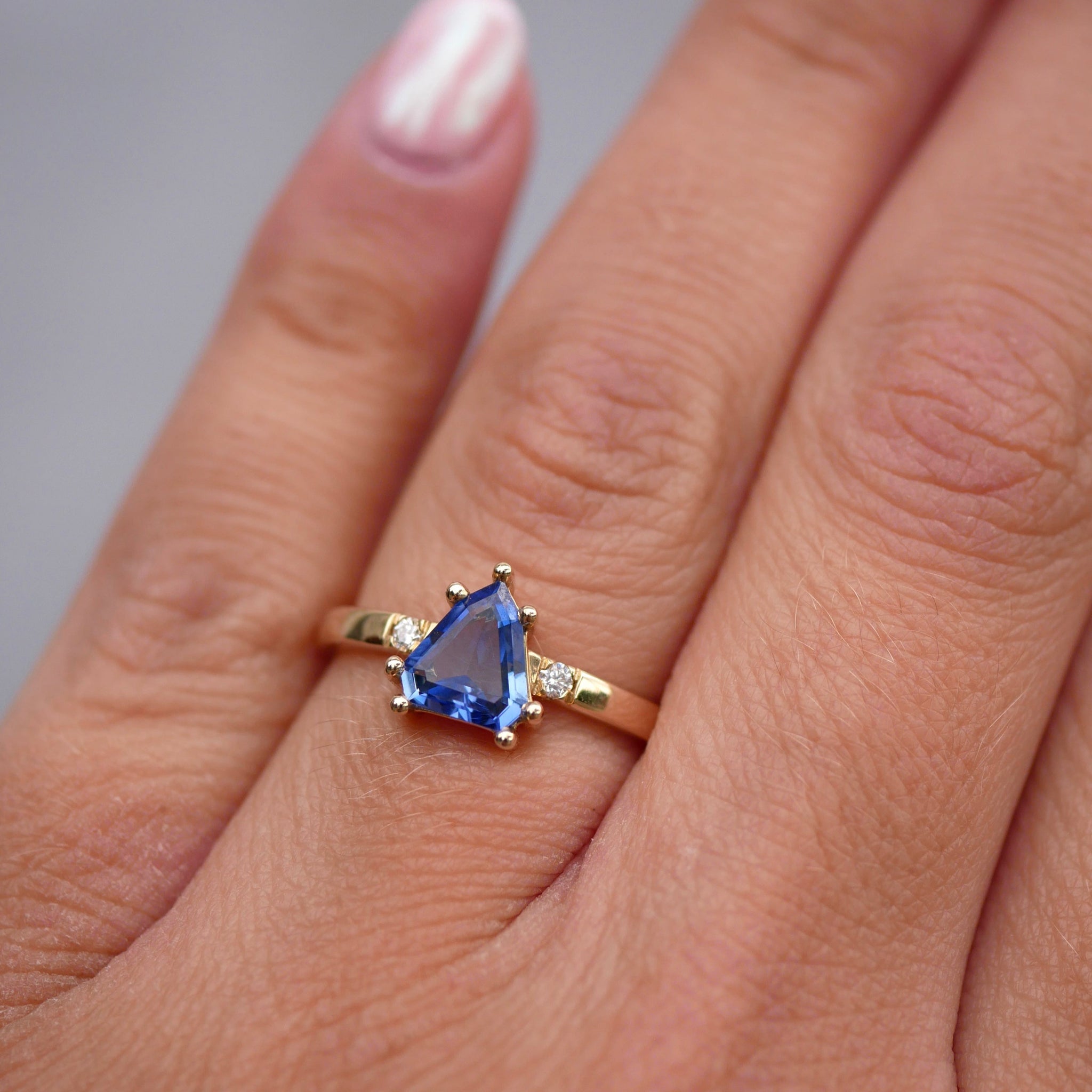 0.82ct Shield Step Cut Sapphire <br><b> Emily Warden Designs </b> Shield Sapphire Ring