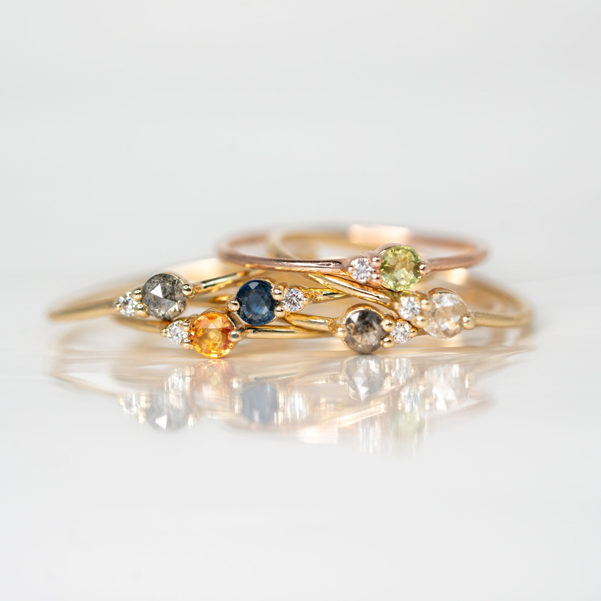 Arktos ring collection with different center stones