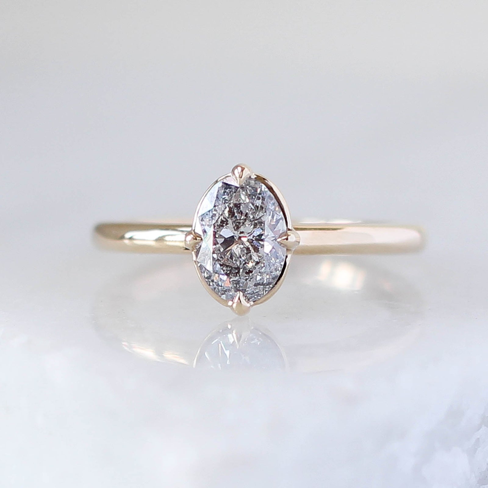 Oval salt and pepper diamond engagement ring