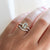  Oval Champagne Salt & Pepper Diamond Ring paired with diamond golden band worn on hand