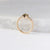  Oval Champagne Salt & Pepper Diamond Ring profile view with marble