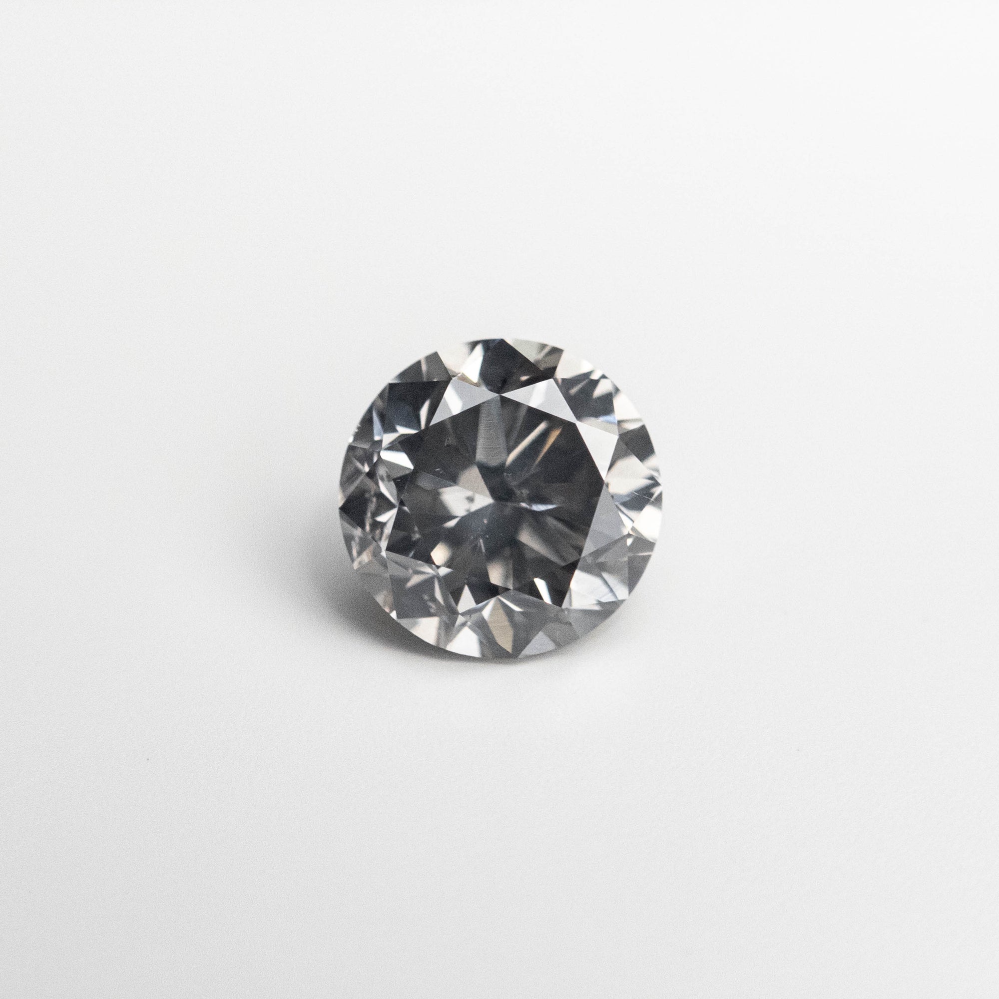 0.66ct 5.34-5.38x3.52mm Fancy Grey Round Brilliant 18968-10