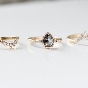 Pear Cut Salt & Pepper Diamond Ring in sunlight side quarter view