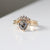 Pear Cut Salt & Pepper Diamond Ring with diamond wave band quarter front view
