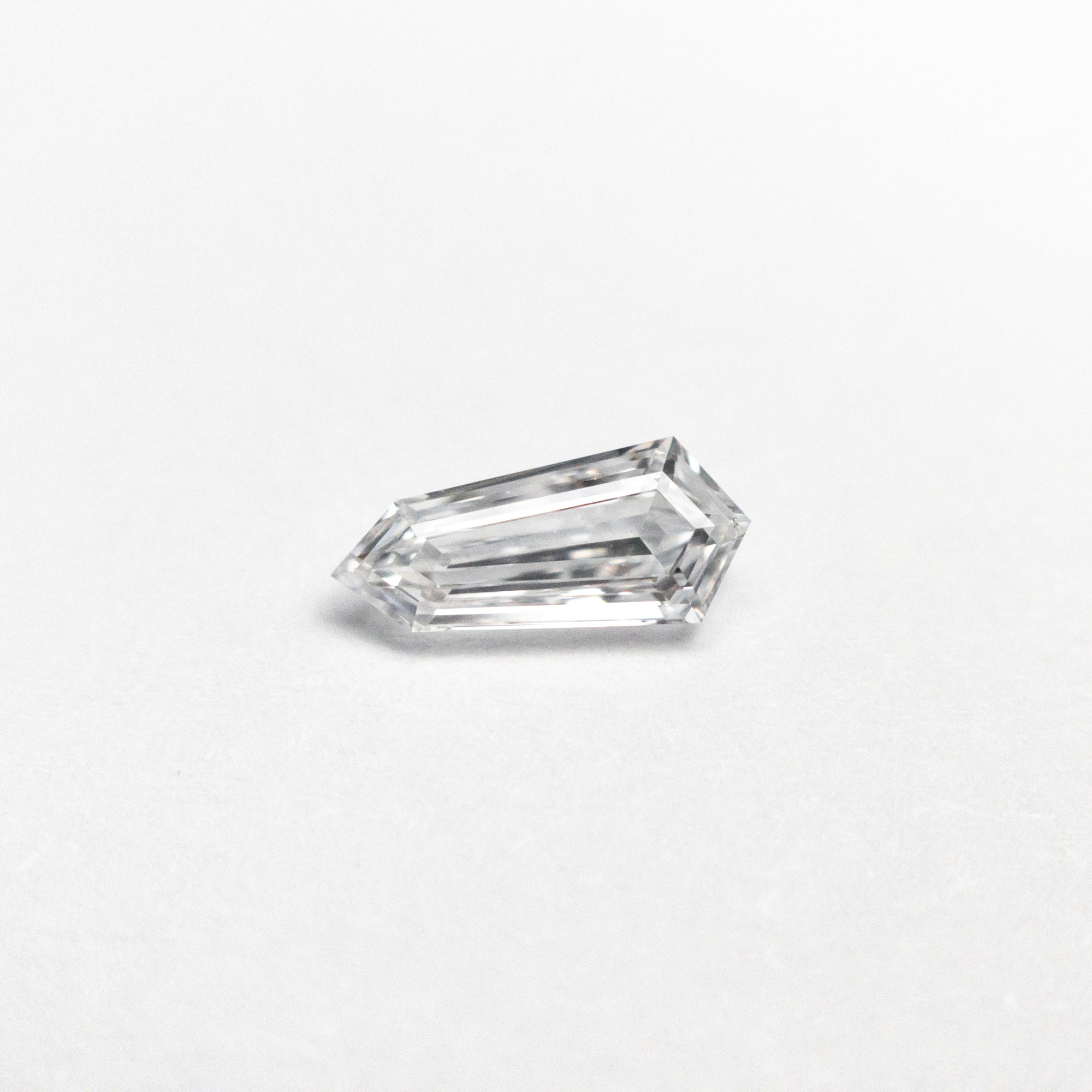 0.30ct 6.95x3.10x1.83mm SI1 D Shield Step Cut 21269-01