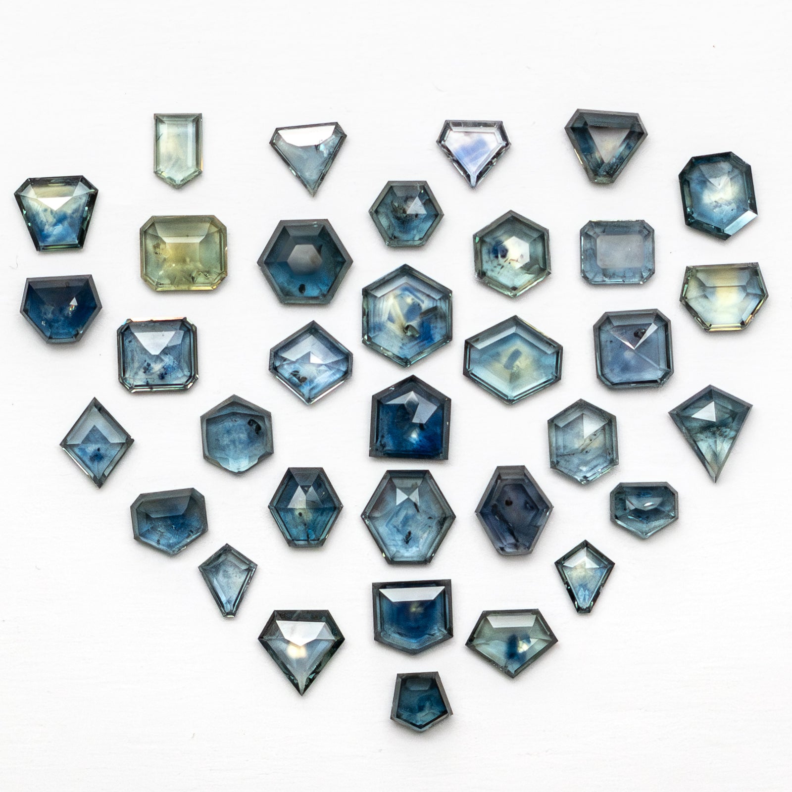 OFFLINE PARCEL 34pc 55.45cttw Portrait Cut Sapphire Parcel 22266-01