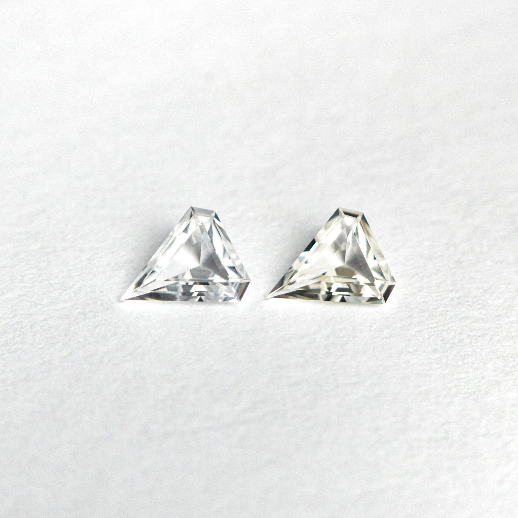 0.20cttw 2pc 3.99x3.50x1.25mm 3.99x3.48x1.28mm Shield Step Cut Sapphire Matching Pair 22775-01