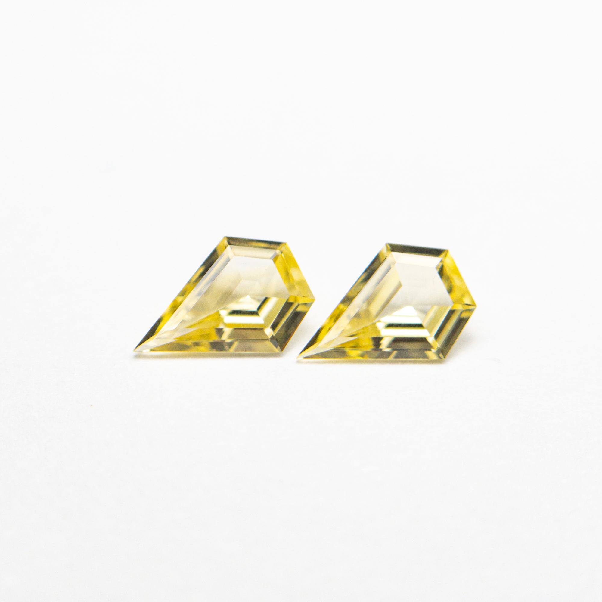 0.30cttw 2pc 5.02x3.49x1.51mm 5.01x3.48x1.50mm Shield Step Cut Sapphire Matching Pair 22779-01