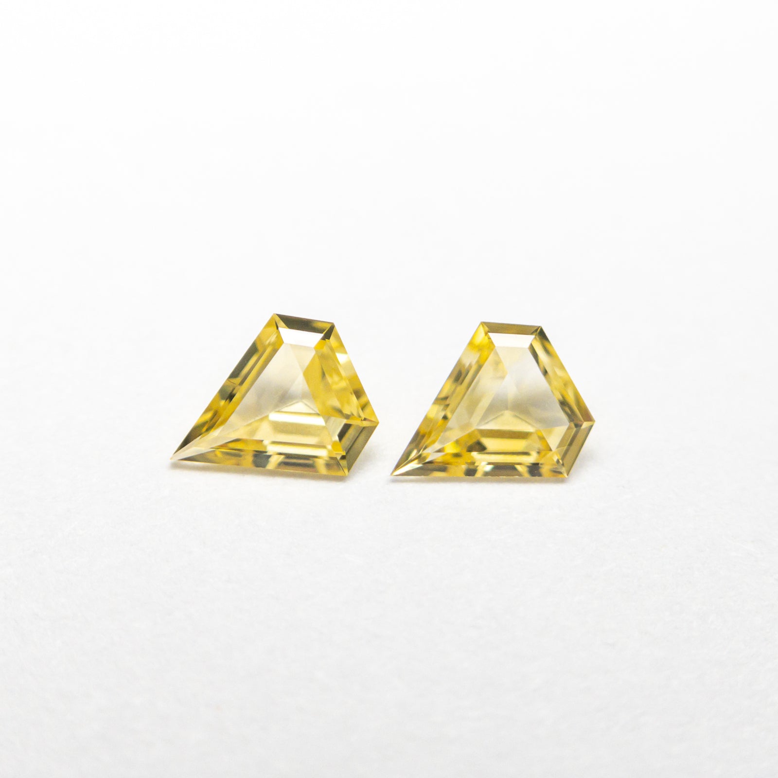 0.21cttw 2pc 4.02x3.46x1.39mm 4.04x3.47x1.22mm Shield Step Cut Sapphire Matching Pair 22793-01