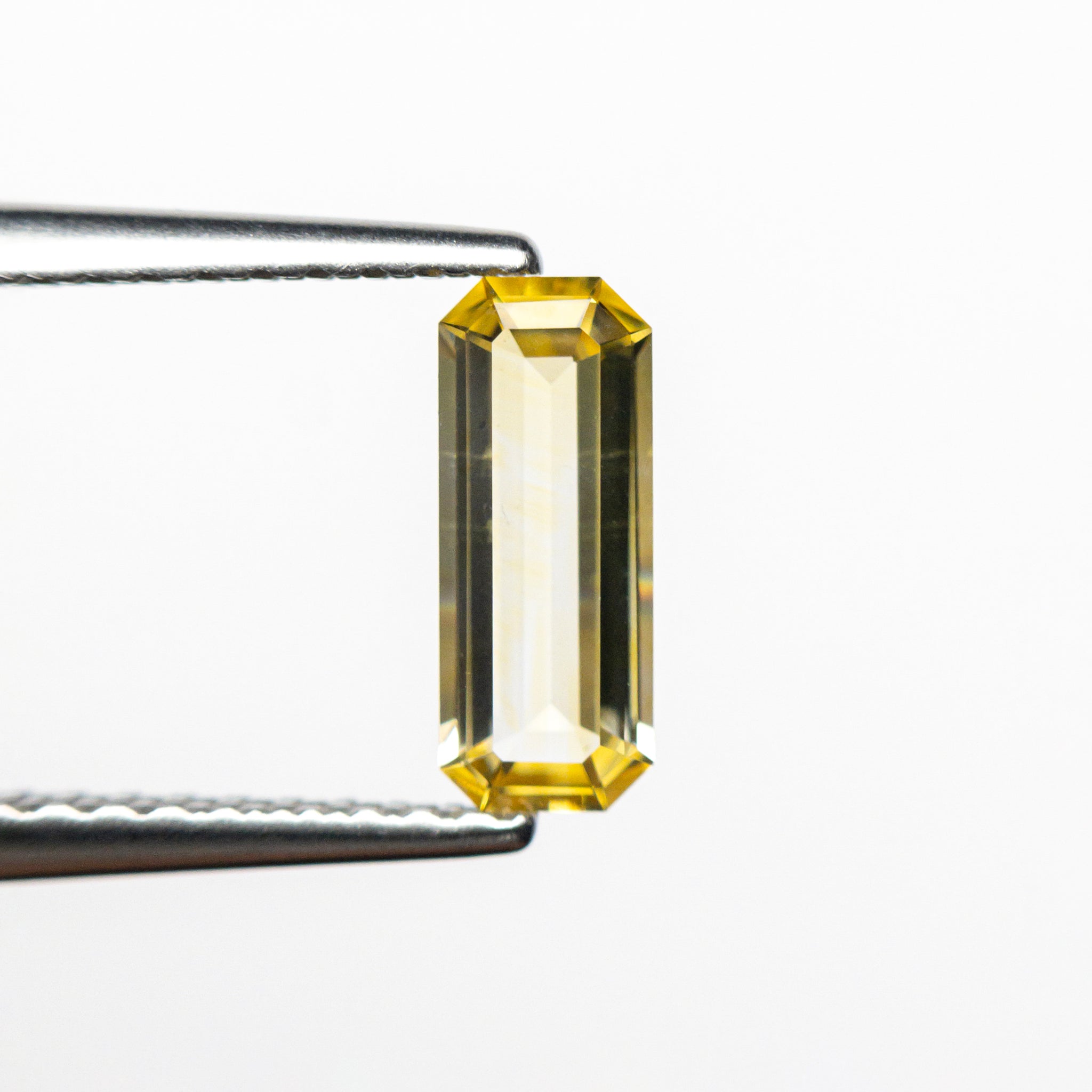 0.57ct 8.18x3.25x1.83mm Cut Corner Rectangle Step Cut Sapphire 230920