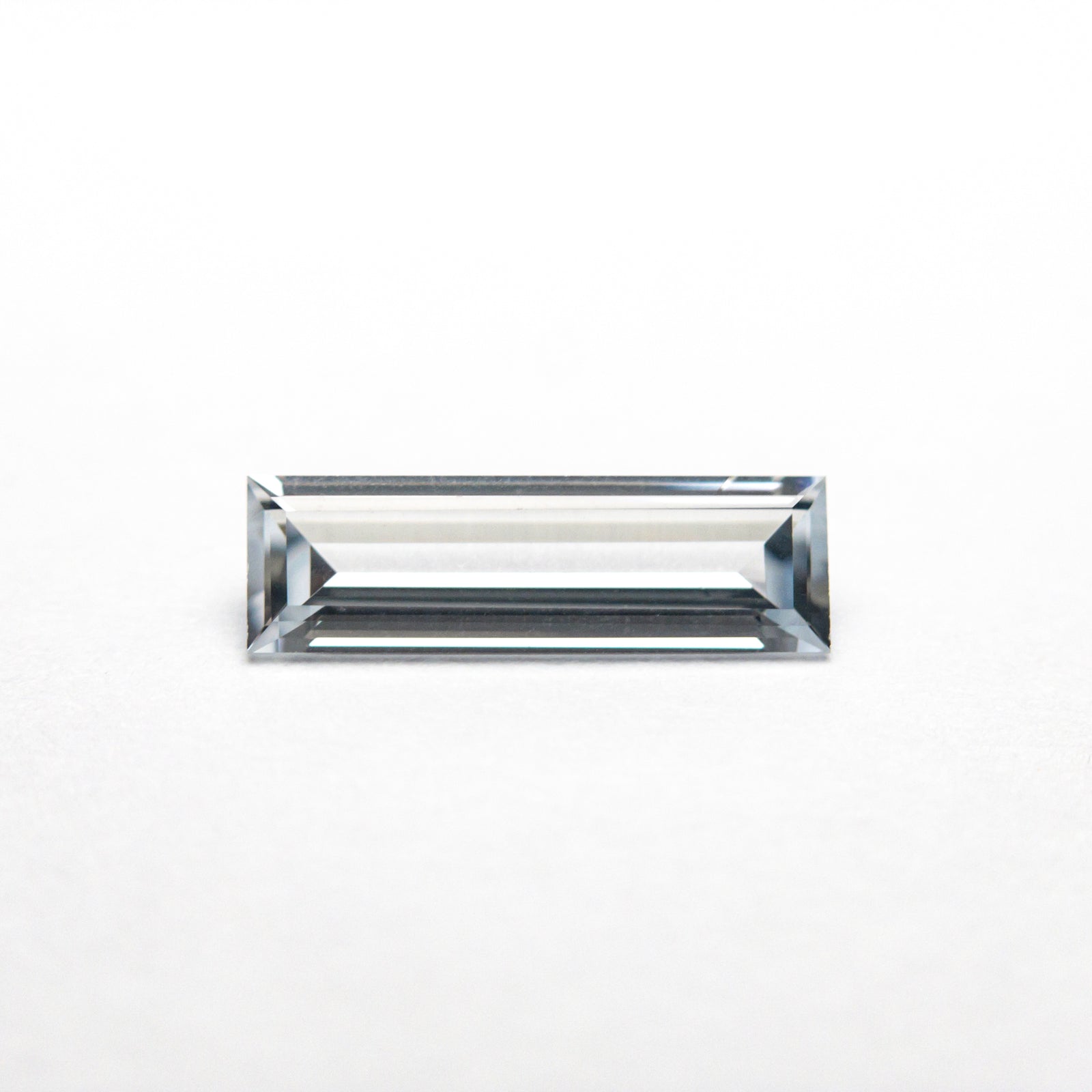 0.26ct 8.04x2.07x1.37mm Baguette Step Cut Sapphire 23125-01