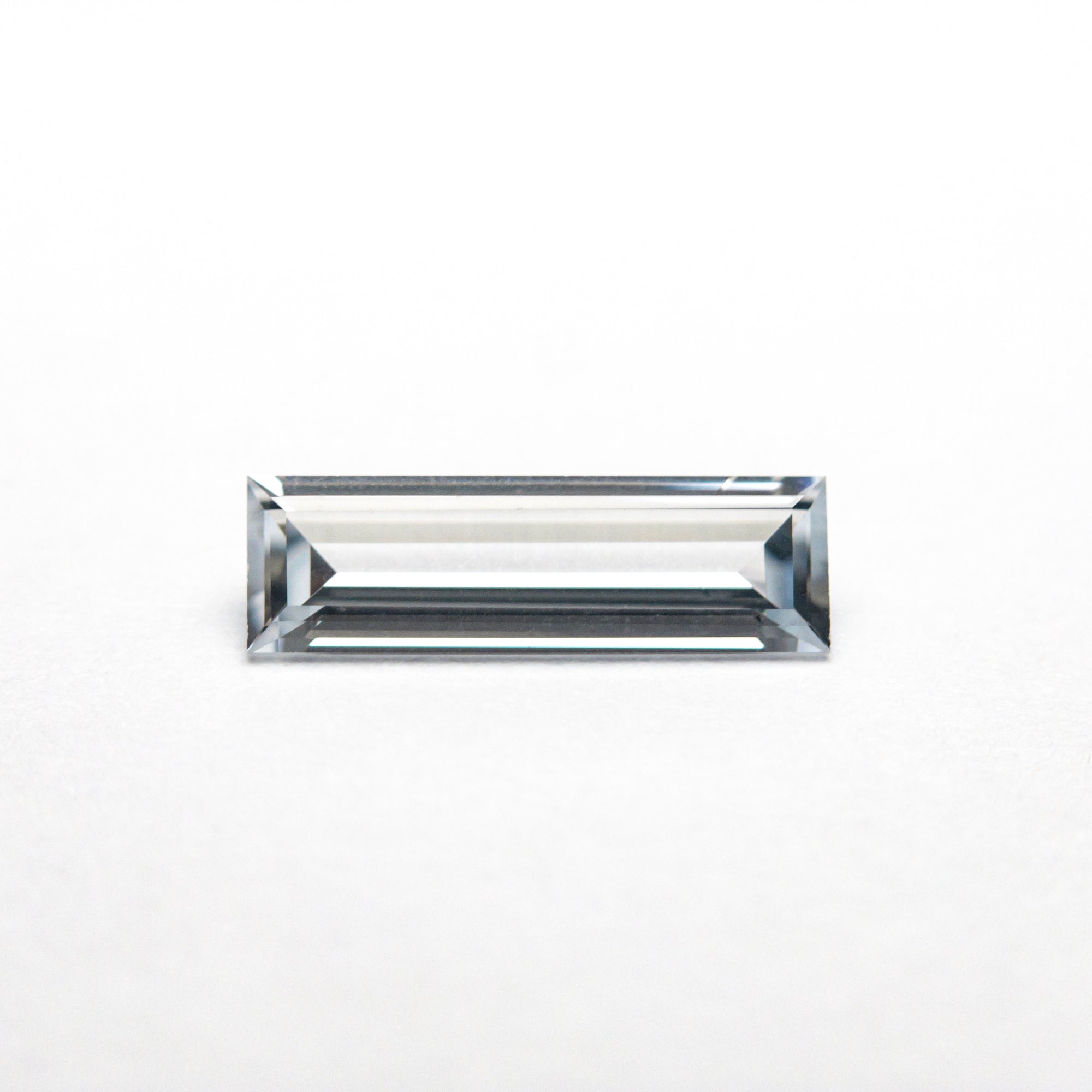 0.26ct 8.04x2.07x1.37mm Baguette Step Cut Sapphire 23125-01