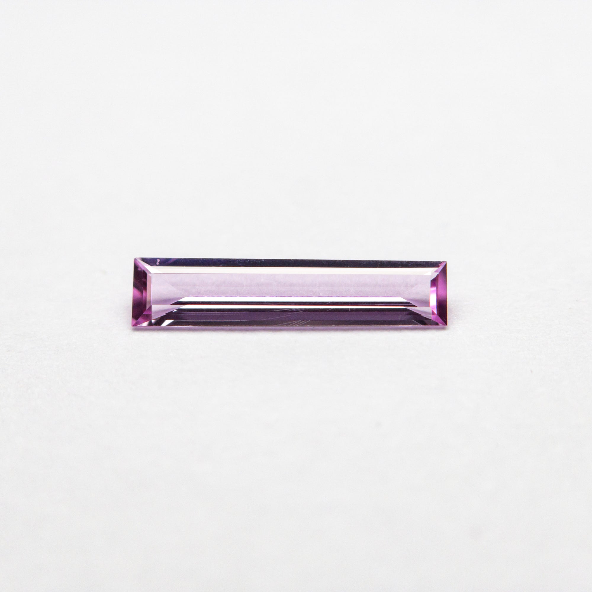 0.21ct 8.73x1.94x1.14mm Baguette Step Cut Sapphire 23134-01