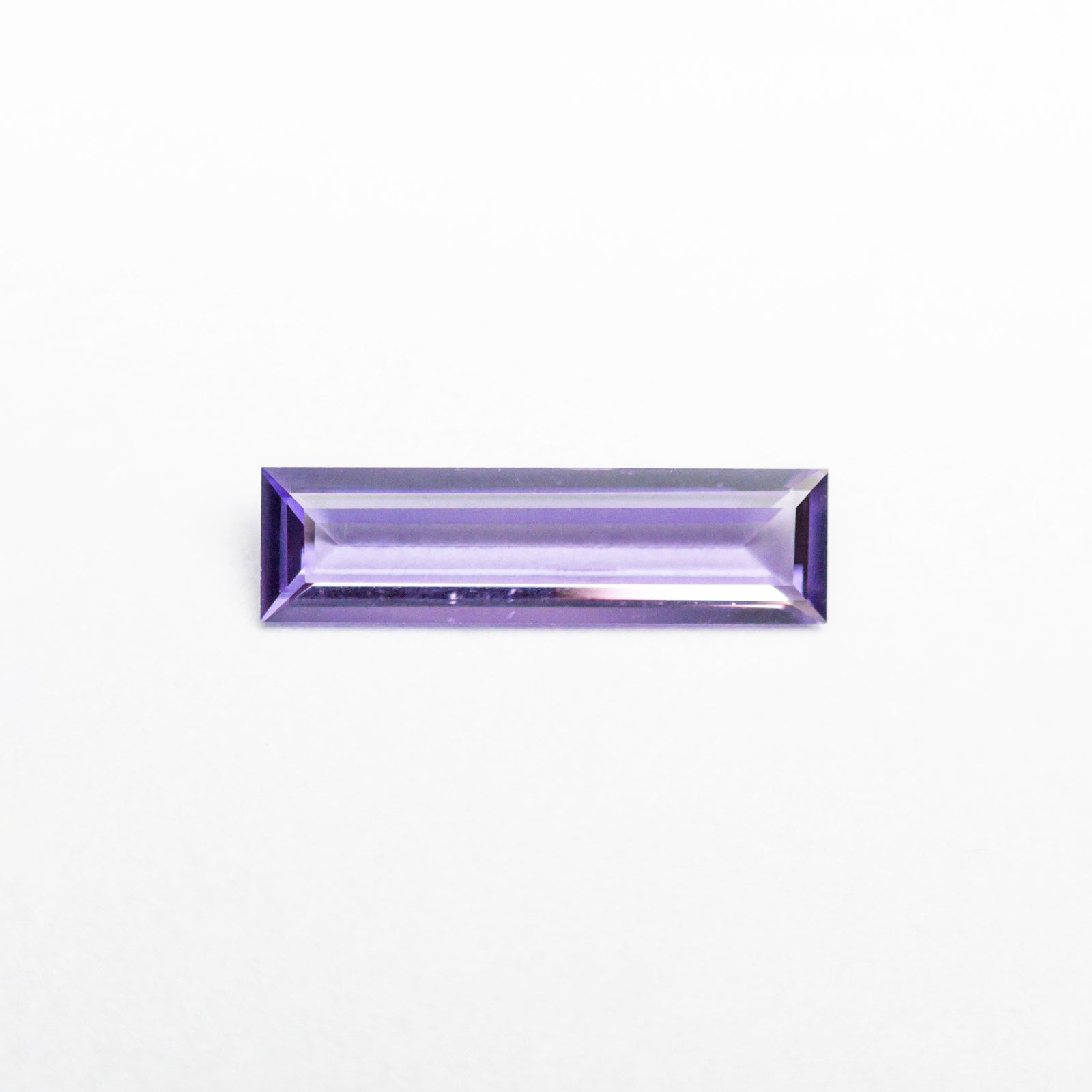 0.28ct 8.71x2.36x1.21mm Baguette Step Cut Sapphire 23145-01