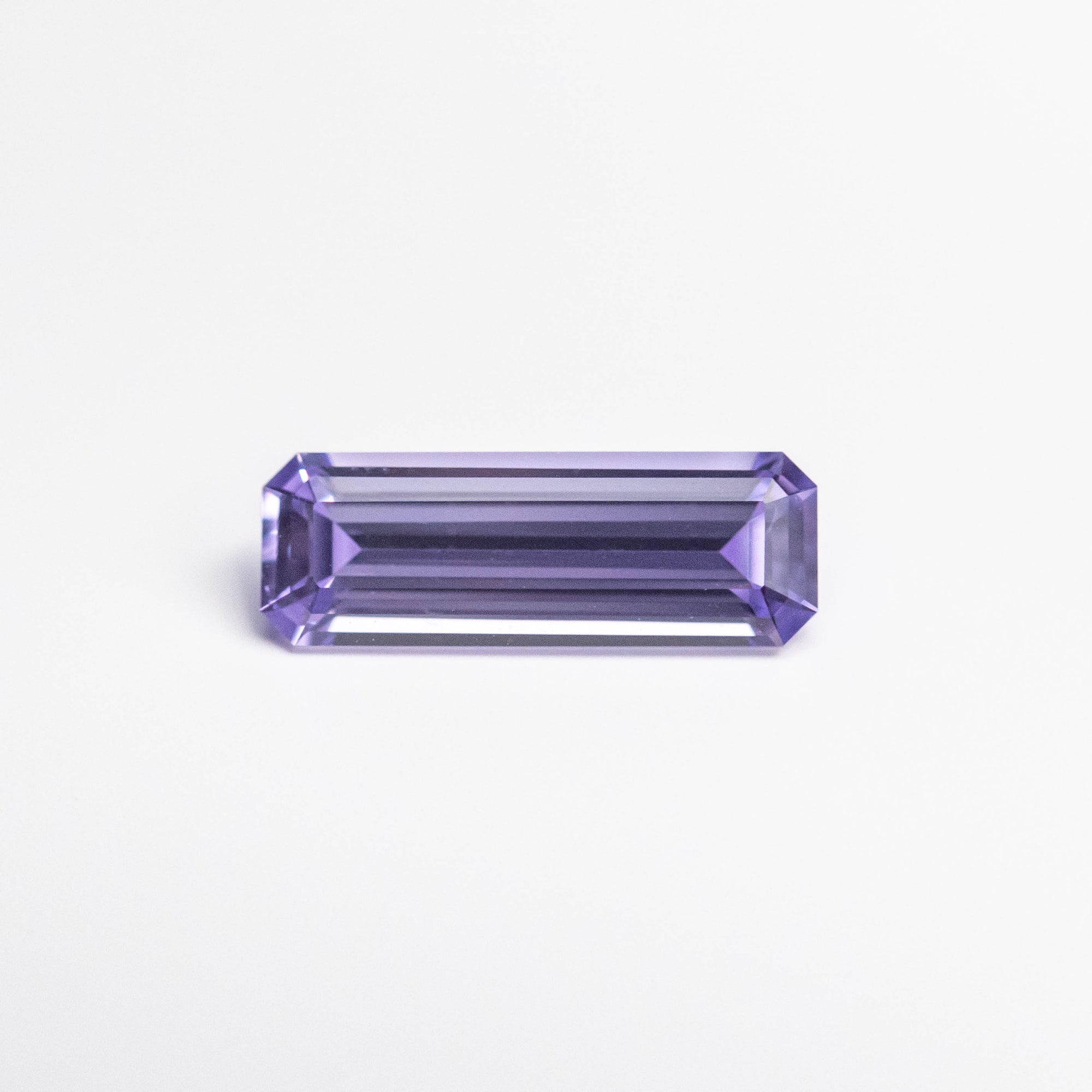 0.49ct 8.07x2.82x1.95mm Cut Corner Rectangle Step Cut Sapphire 23153-01