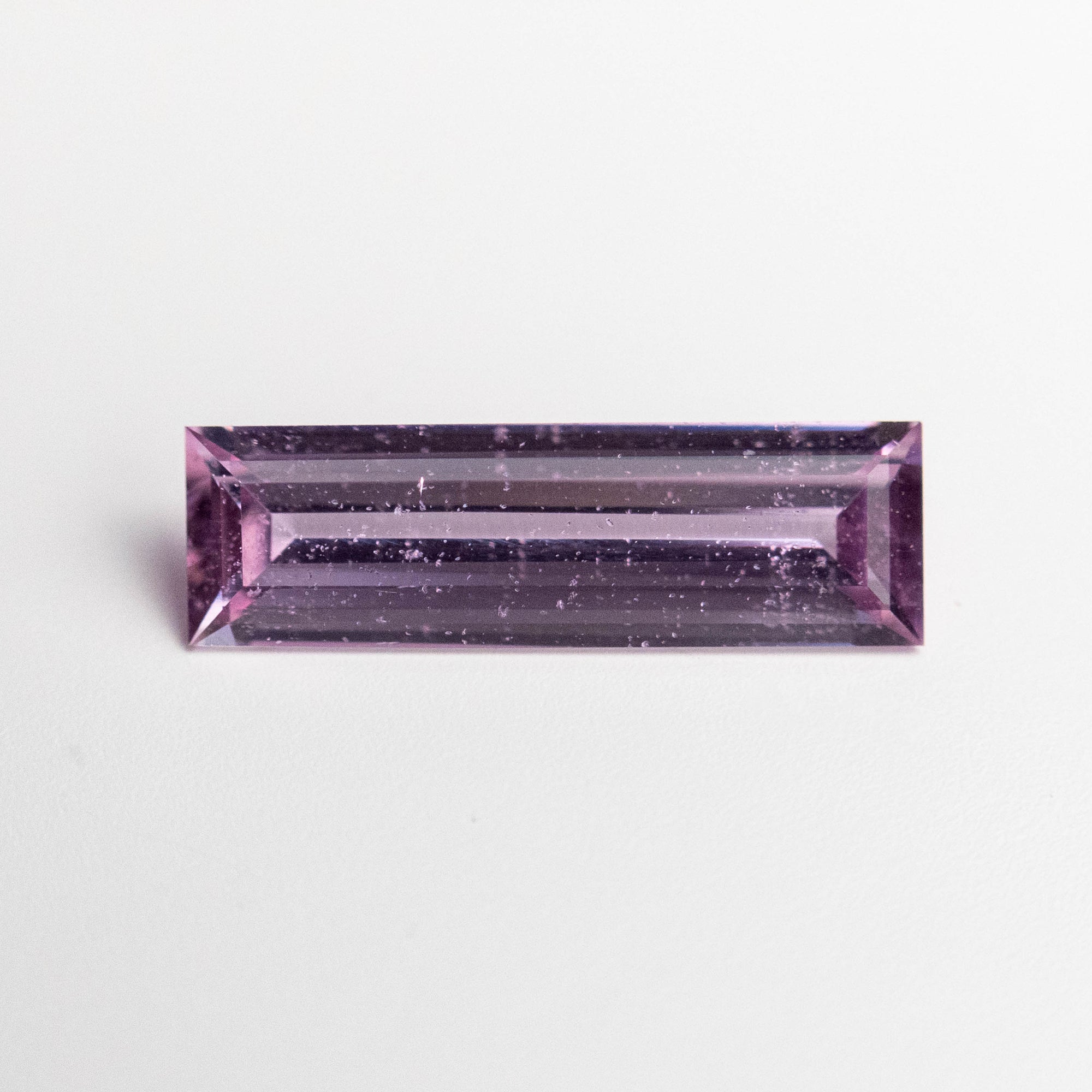 0.63ct 10.23x3.02x1.84mm Baguette Step Cut Sapphire 23154-01