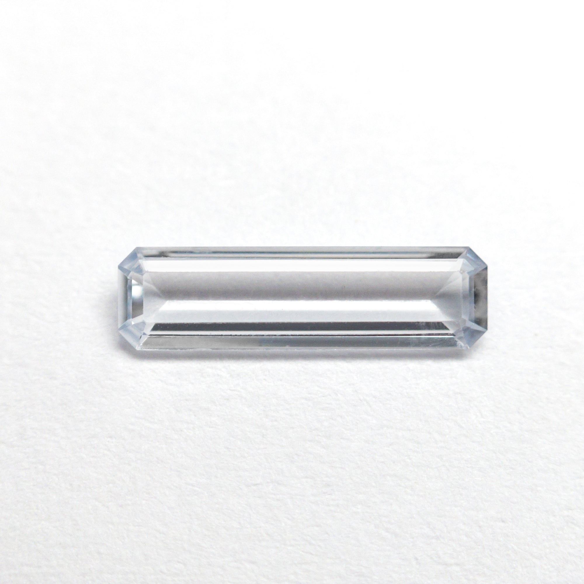 0.51ct 10.53x2.93x1.40mm Cut Corner Rectangle Step Cut Sapphire 23156-01
