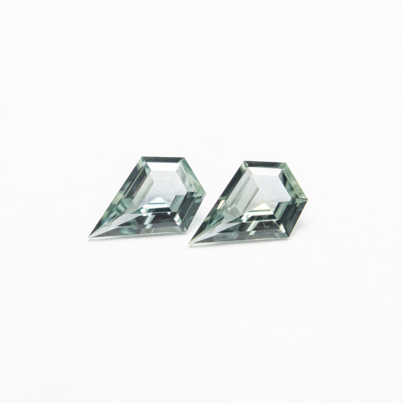 0.31cttw 2pc 5.00x3.43x1.51mm 4.92x3.47x1.55mm Shield Step Cut Sapphire Matching Pair 23402-01