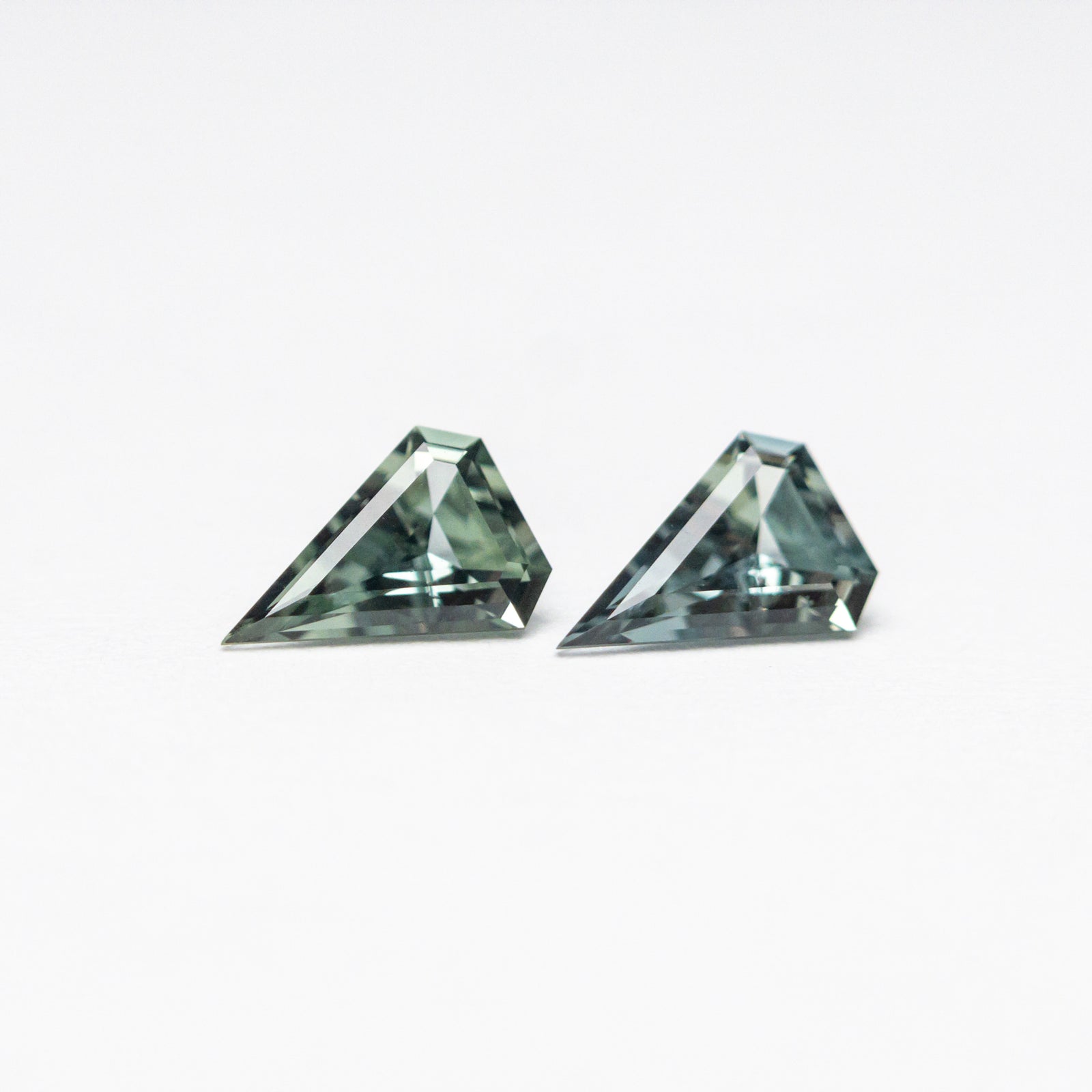 0.35cttw 2pc 4.98x3.49x1.87mm 4.99x3.50x1.89mm Shield Step Cut Sapphire Matching Pair 23403-01