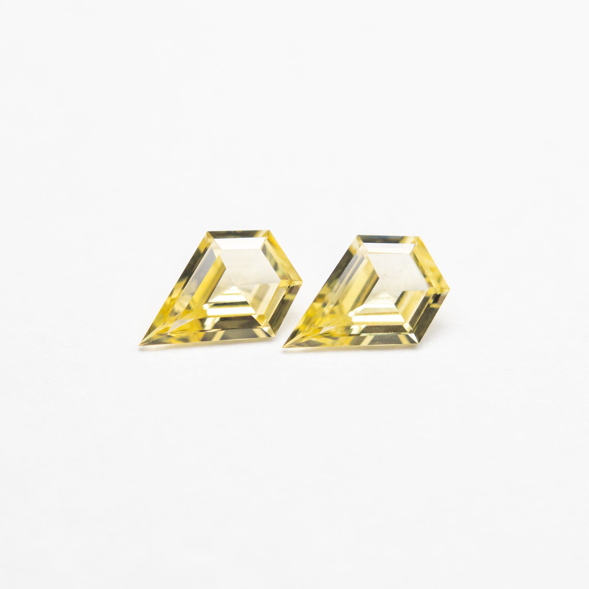0.31cttw 2pc 5.02x3.49x1.51mm 4.93x3.53x1.51mm Shield Step Cut Sapphire Matching Pair 23404-01