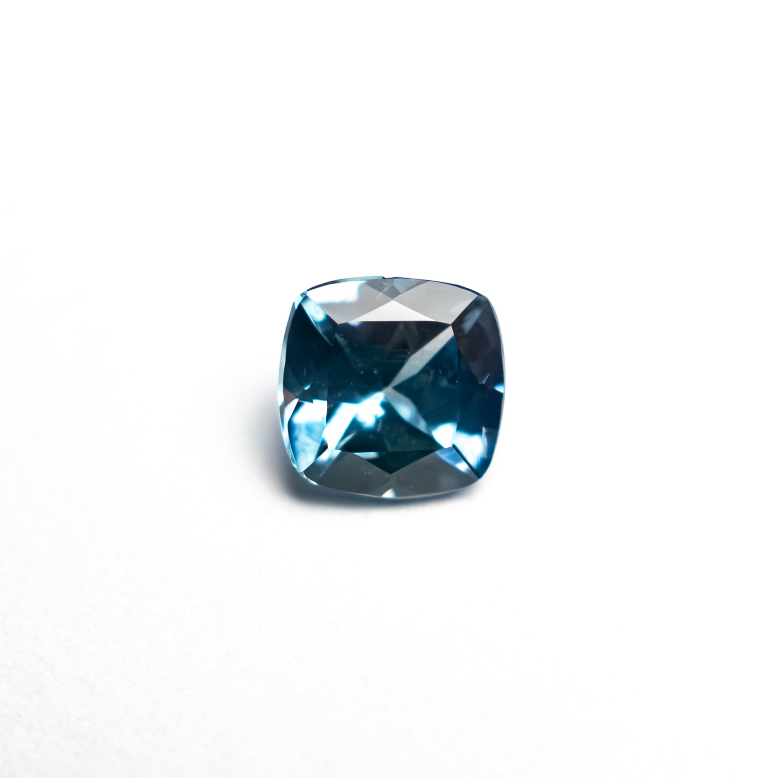 0.63ct 4.97x4.84x3.04mm Cushion Brilliant Sapphire 23466-18