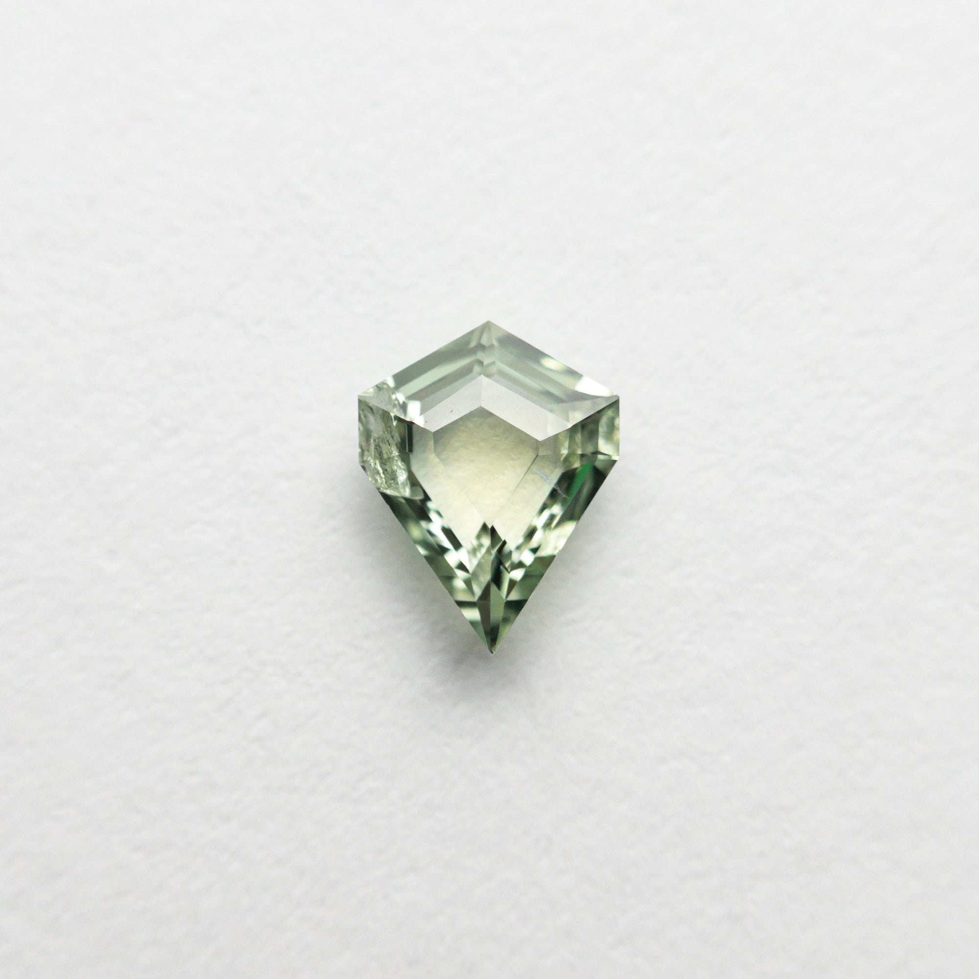 0.34ct 5.51x4.30x2.11mm Shield Portrait Cut Sapphire 23474-19