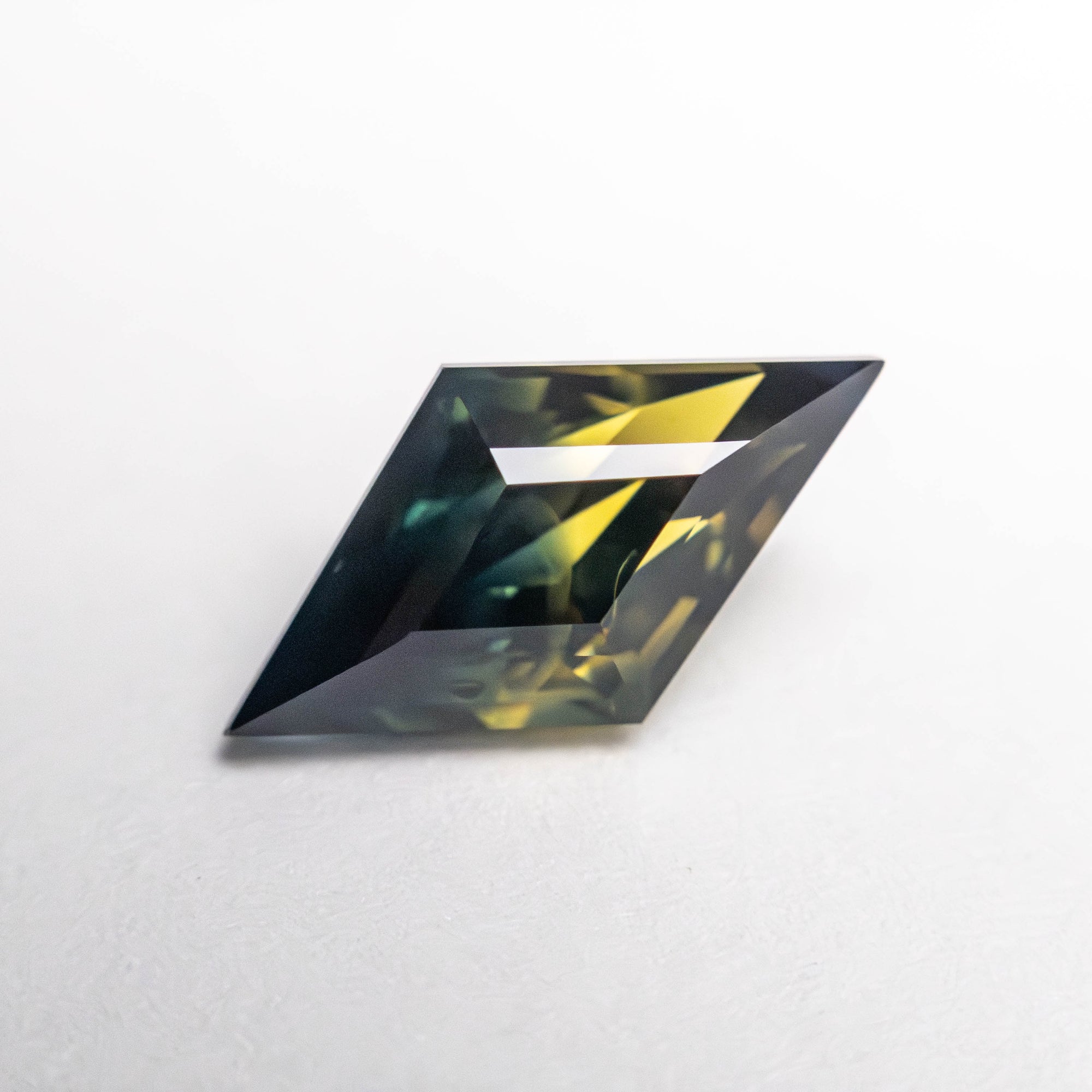 1.86ct 11.79x6.39x4.78mm Lozenge Step Cut Sapphire 23484-02