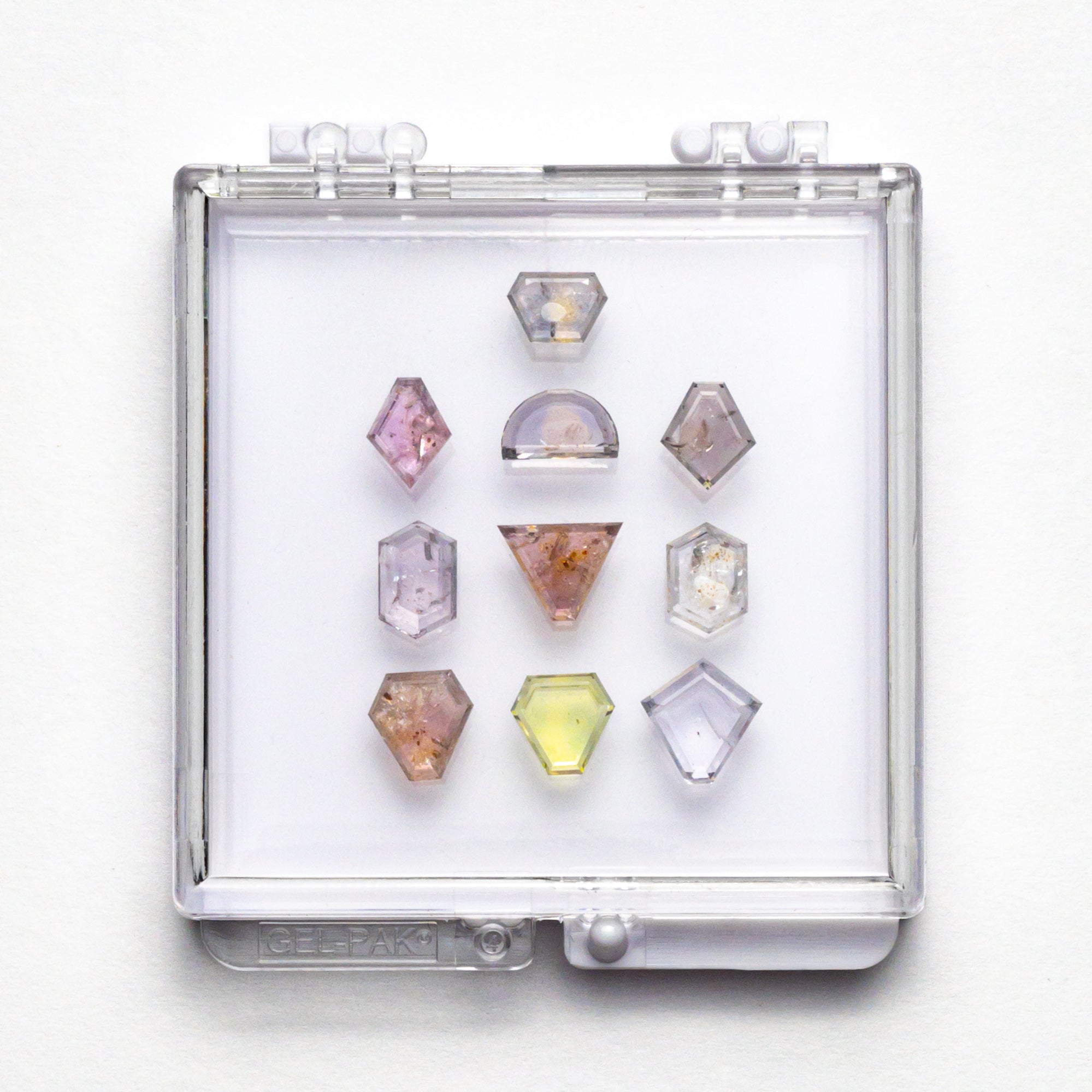 16.22cttw 10pc Geometric Portrait Cut Sapphire Parcel 23665-00