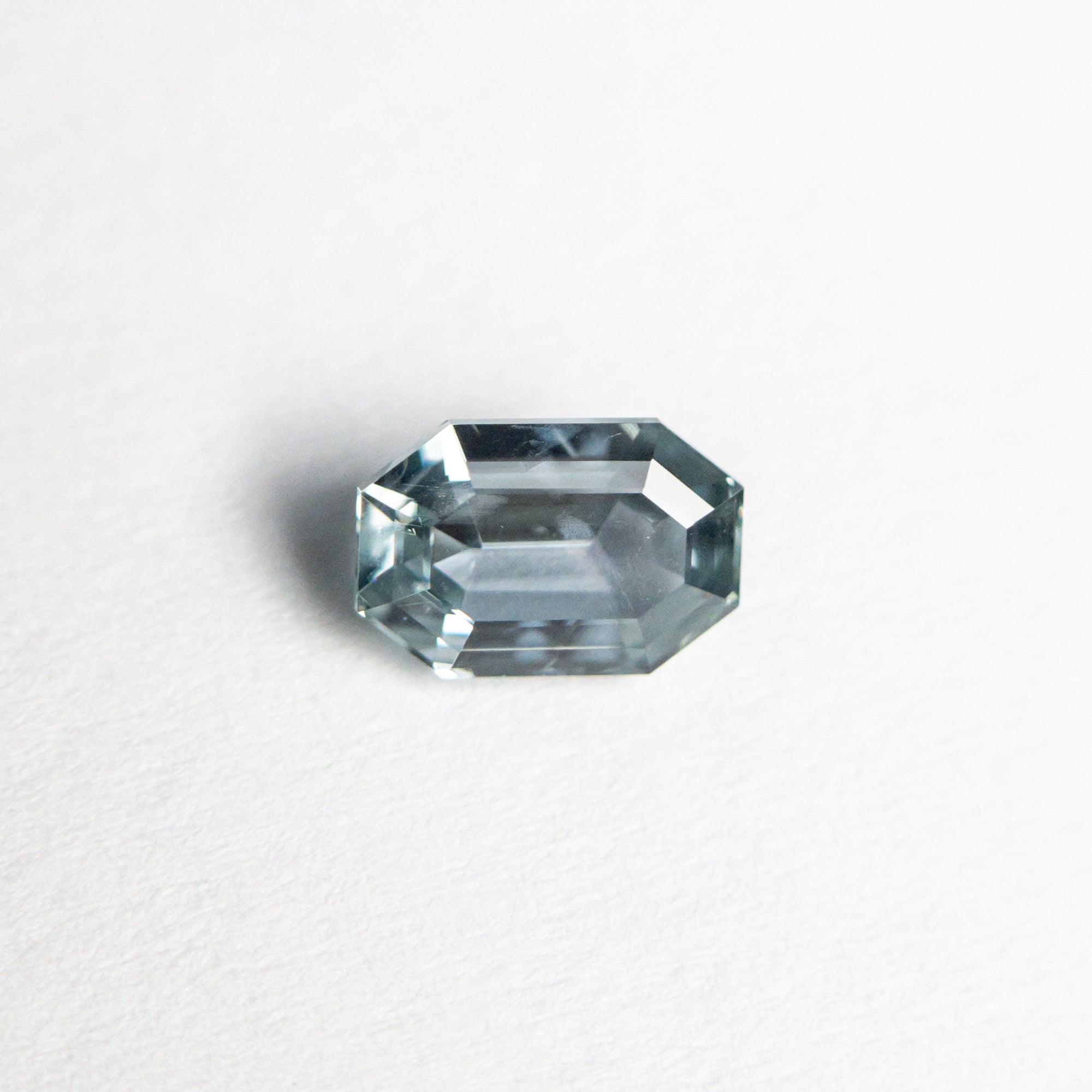 0.64ct 5.83x3.94x2.65mm Cut Corner Rectangle Step Cut Sapphire 23705-06