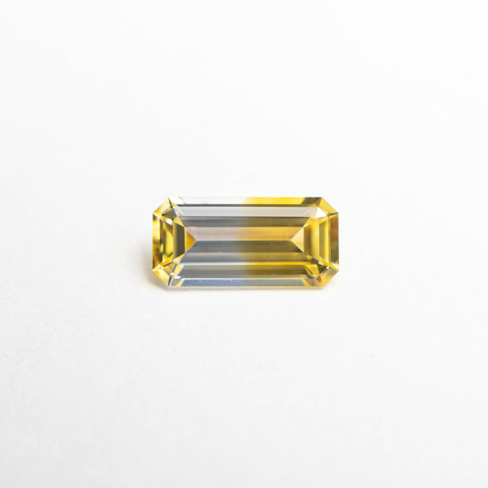 0.55ct 7.02x3.39x2.13mm Cut Corner Rectangle Step Cut Sapphire 23724-01