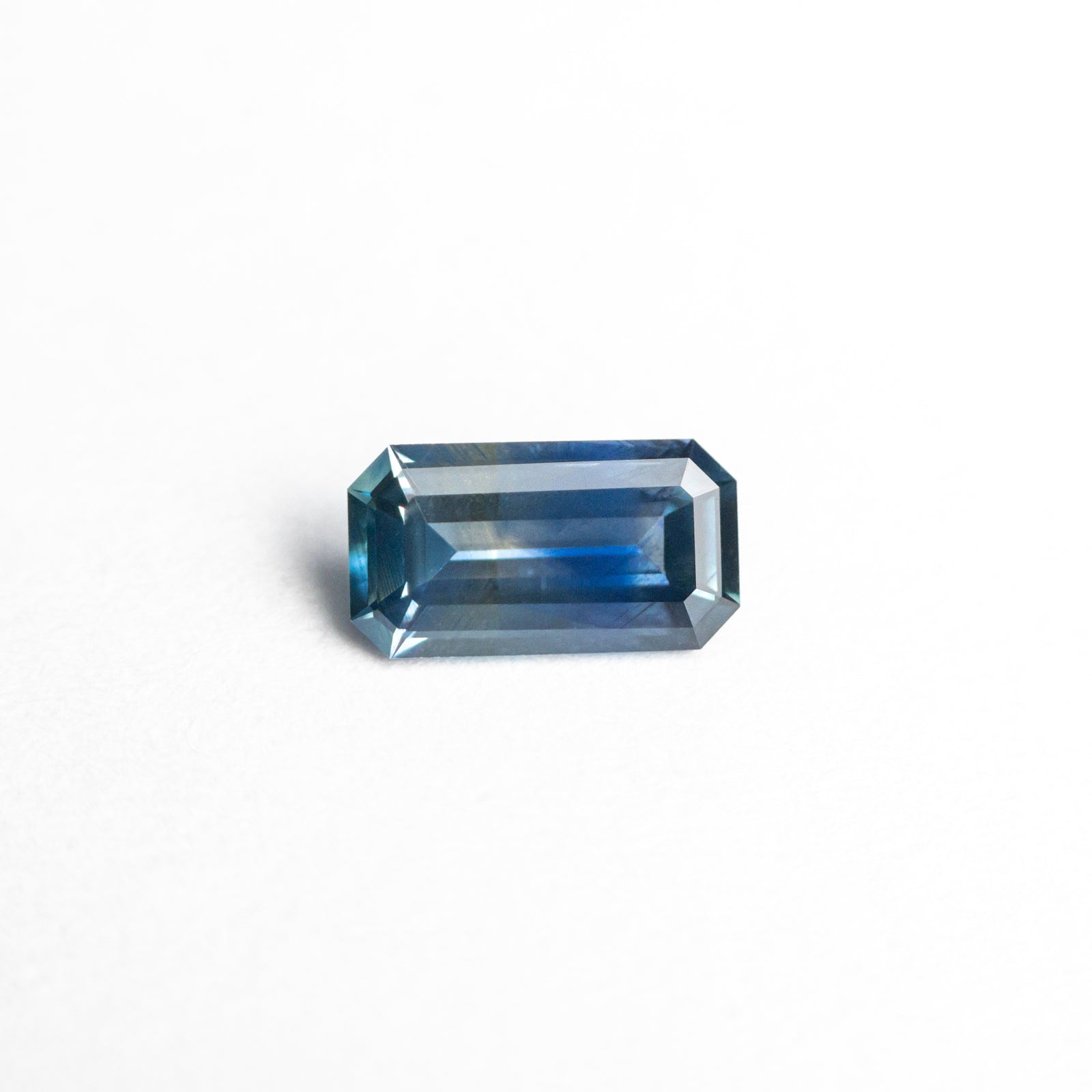 0.39ct 5.94x3.21x1.92mm Cut Corner Rectangle Step Cut Sapphire 23749-01