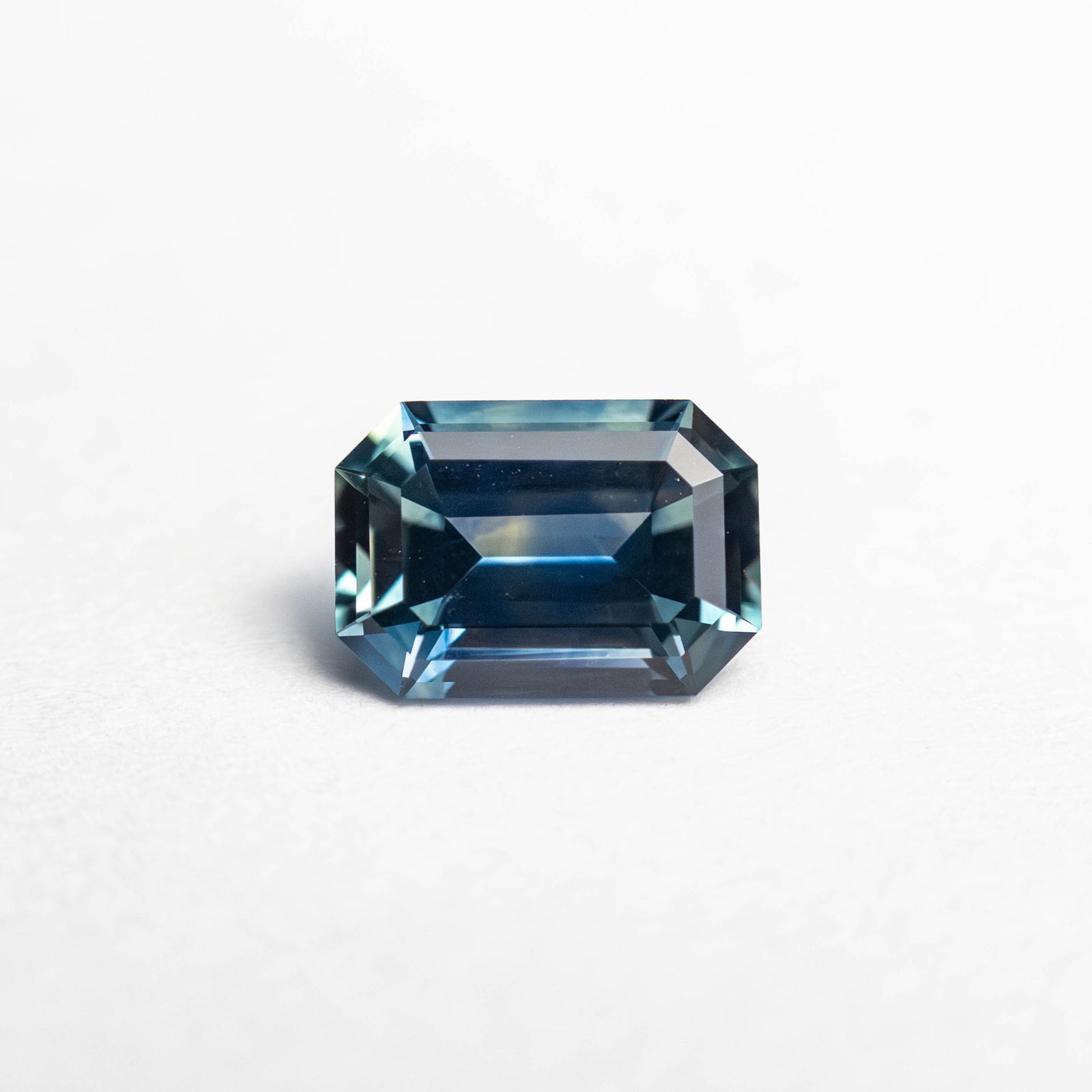 0.68ct 6.01x4.24x2.82mm Cut Corner Rectangle Step Cut Sapphire 23756-01