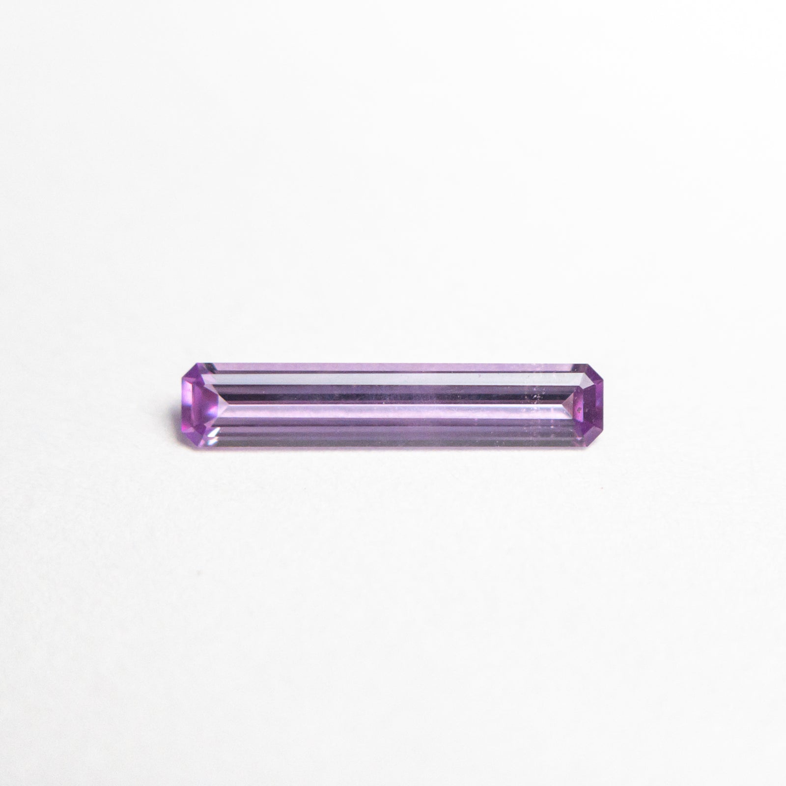 0.30ct 9.98x1.97x1.30mm Cut Corner Rectangle Step Cut Sapphire 23770-02