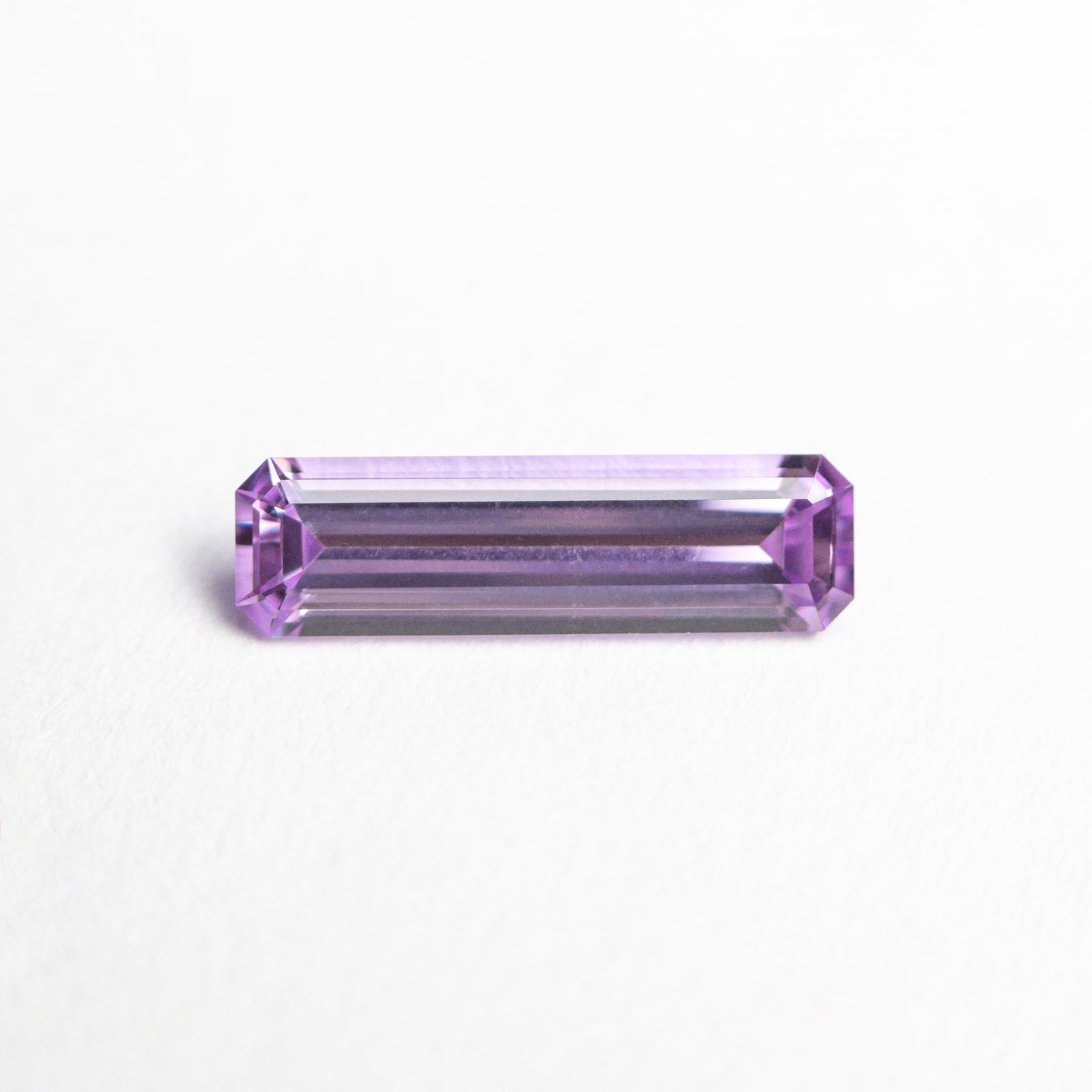 0.60ct 9.52x2.74x1.98mm Cut Corner Rectangle Step Cut Sapphire 23771-04