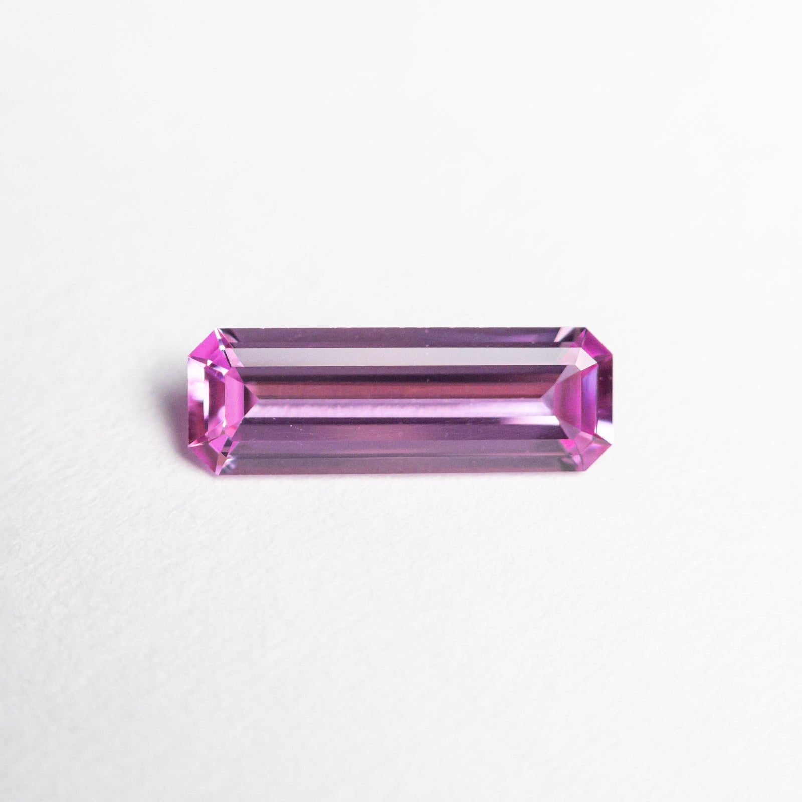 0.56ct 8.79x3.01x1.86mm Cut Corner Rectangle Step Cut Sapphire 23775-02