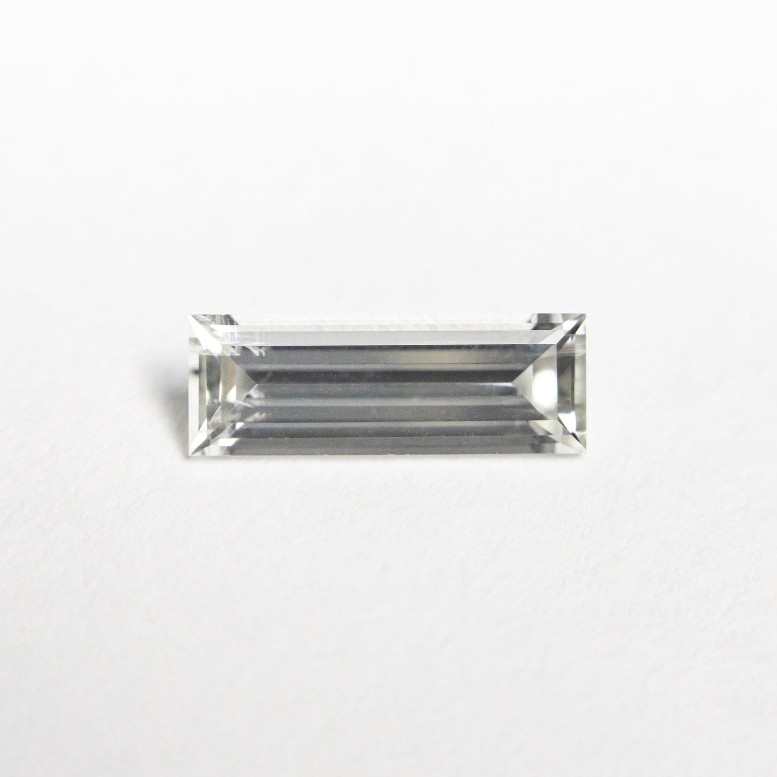 0.61ct 8.51x3.01x2.09mm Baguette Step Cut Sapphire 23775-03