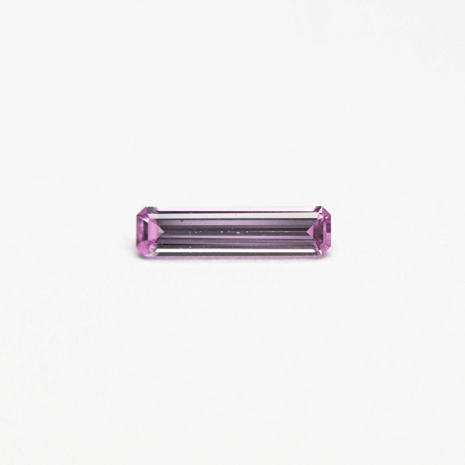 0.26ct 7.92x2.02x1.42mm Cut Corner Rectangle Step Cut Sapphire 23777-02