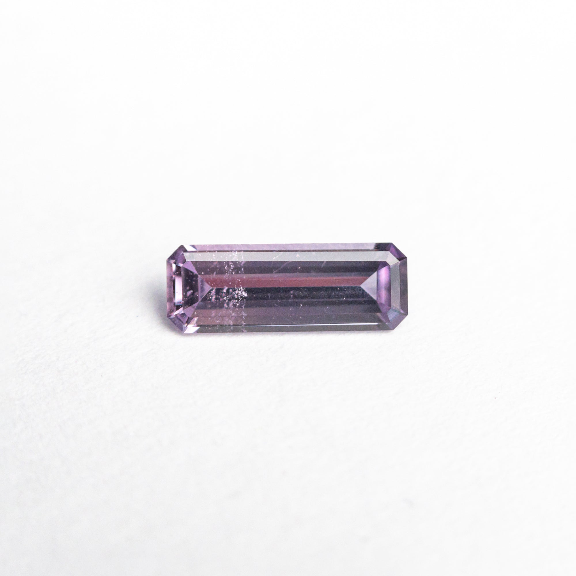 0.31ct 6.93x2.51x1.60mm Cut Corner Rectangle Step Cut Sapphire 23778-09