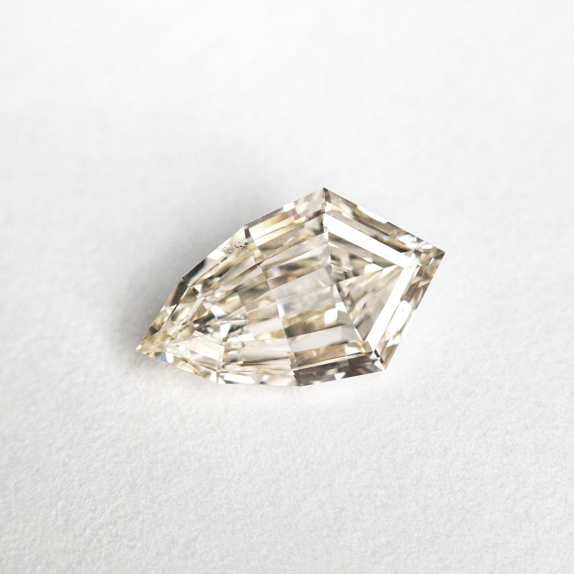 0.79ct 9.16x5.40x2.44mm SI1 C1 Shield Step Cut 23922-02
