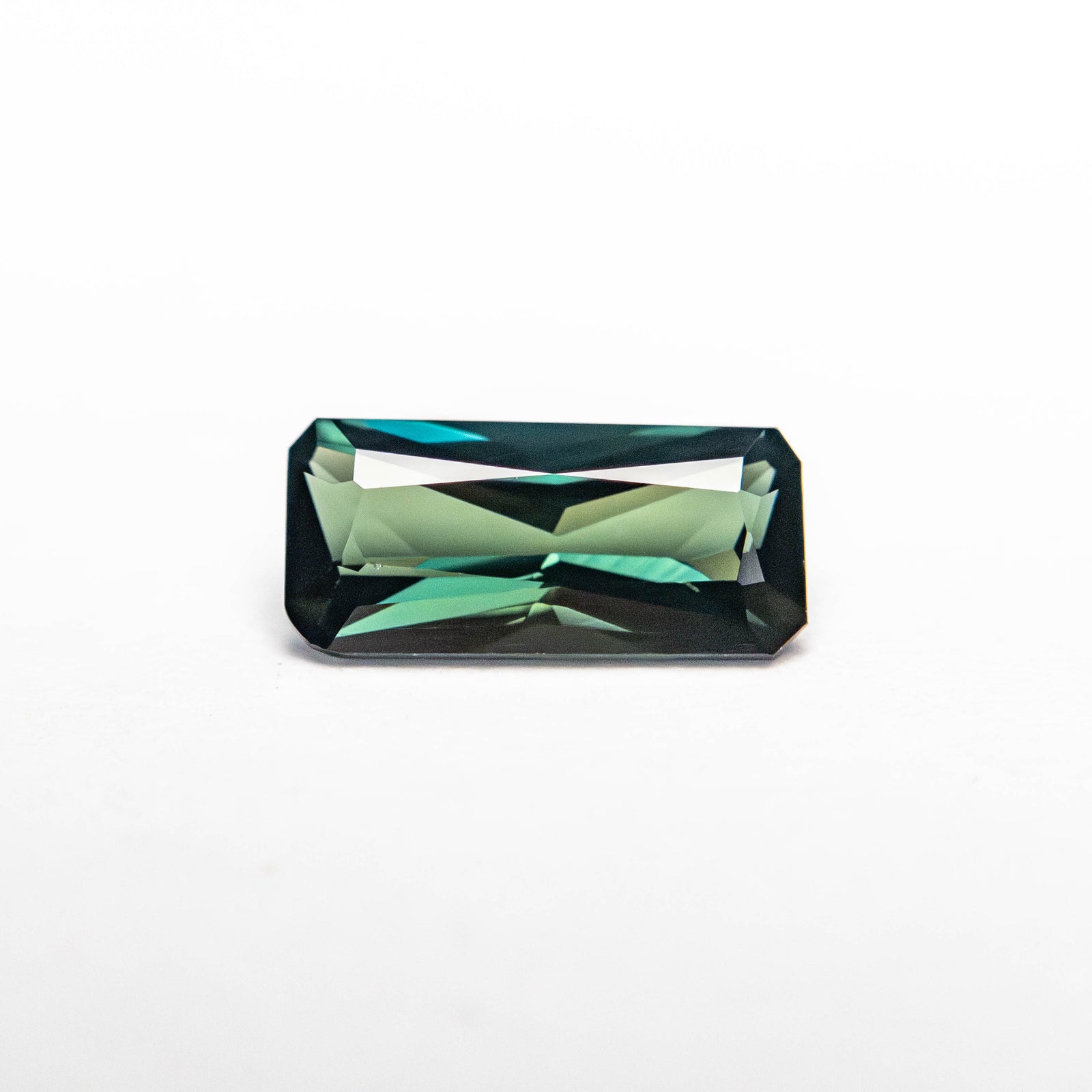 0.71ct 7.73x3.63x2.45mm Cut Corner Rectangle Brilliant Sapphire 25199-03