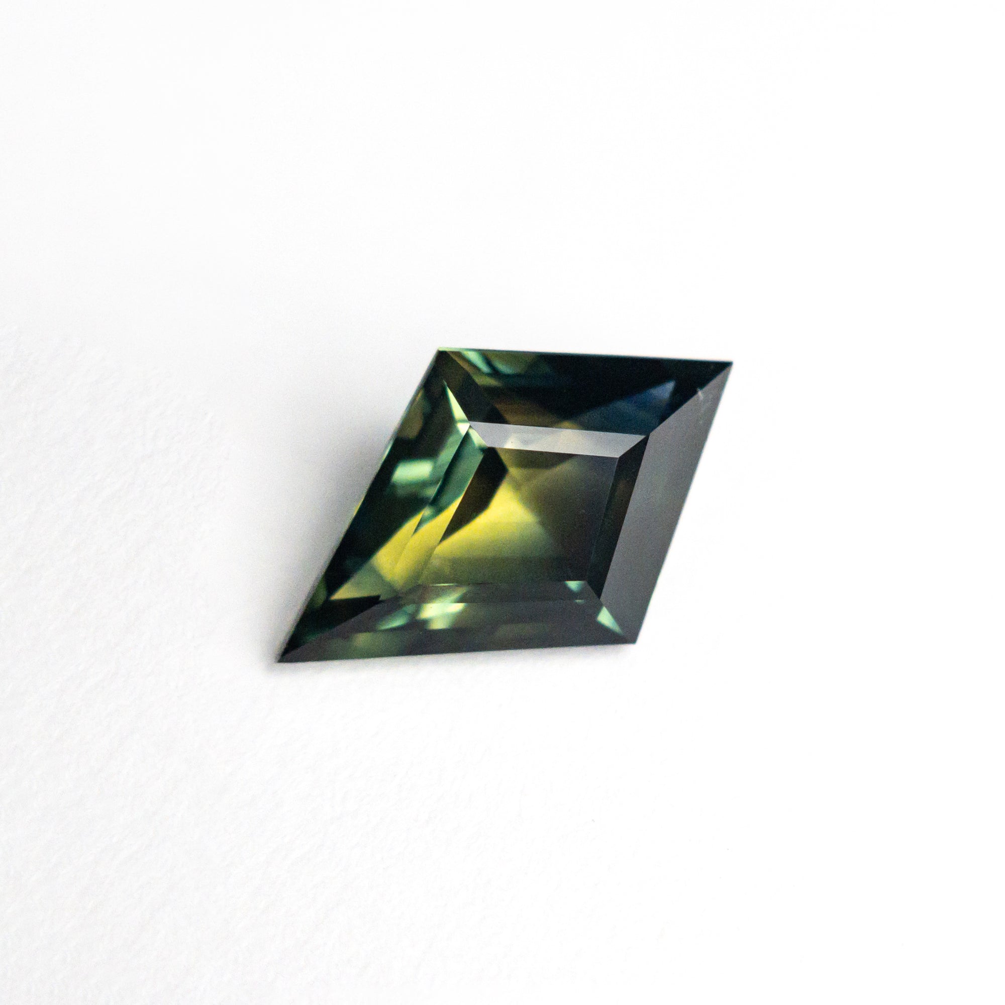 1.33ct 10.48x6.87x3.56mm Kite Step Cut Sapphire 25386-03