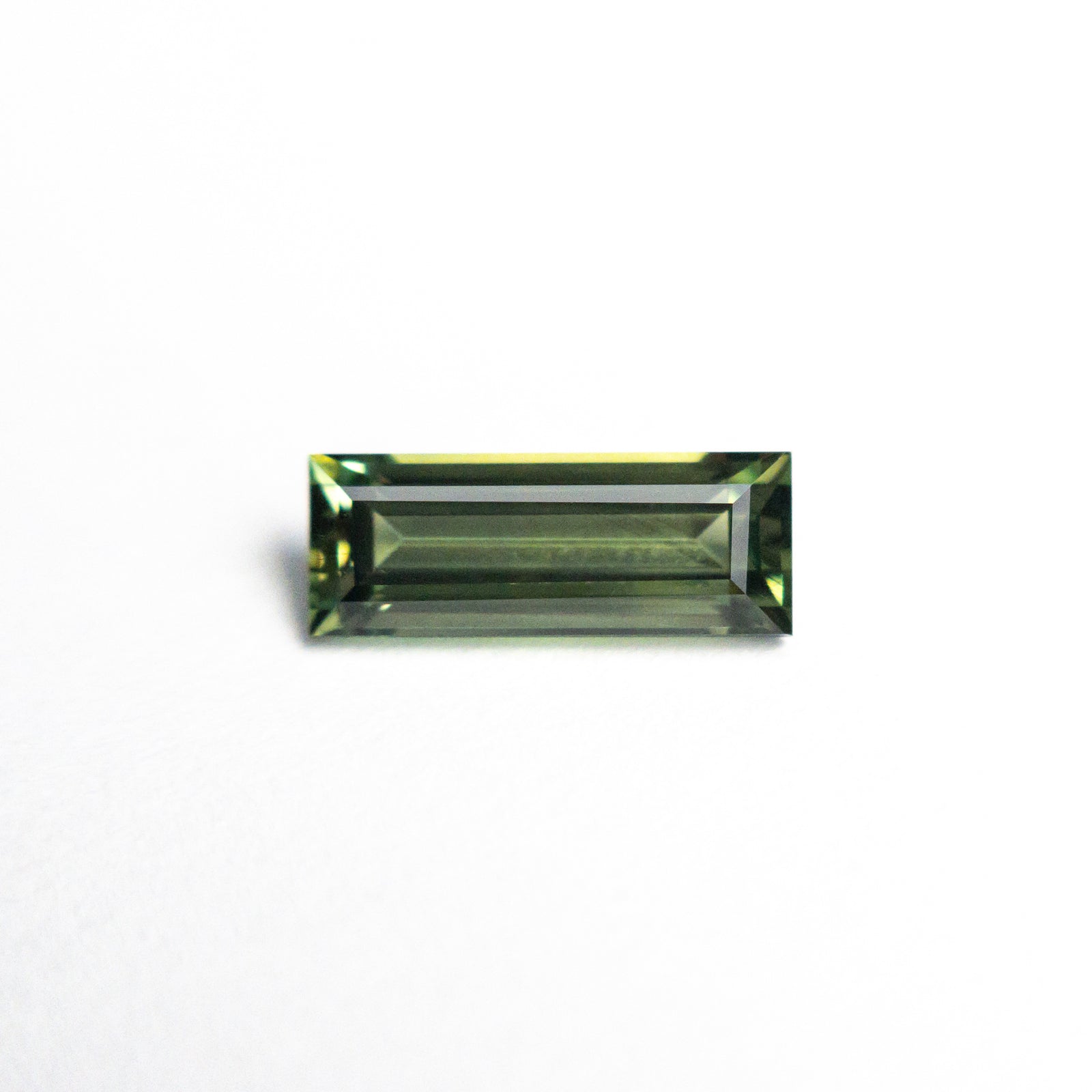 0.85ct 8.45x3.22x2.61mm Rectangle Step Cut Sapphire 25740-03