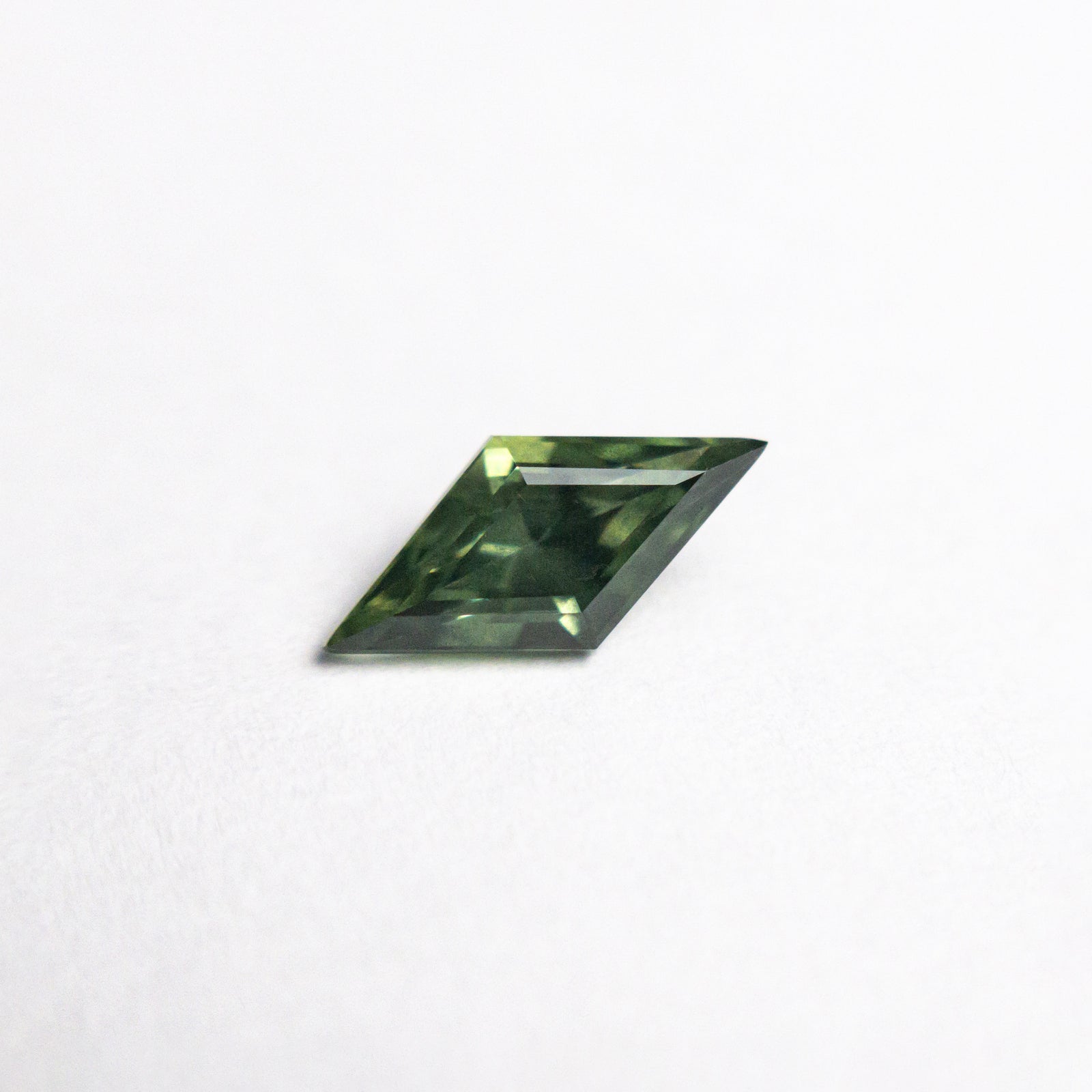 0.62ct 8.76x4.28x3.13mm Lozenge Step Cut Sapphire 25740-04