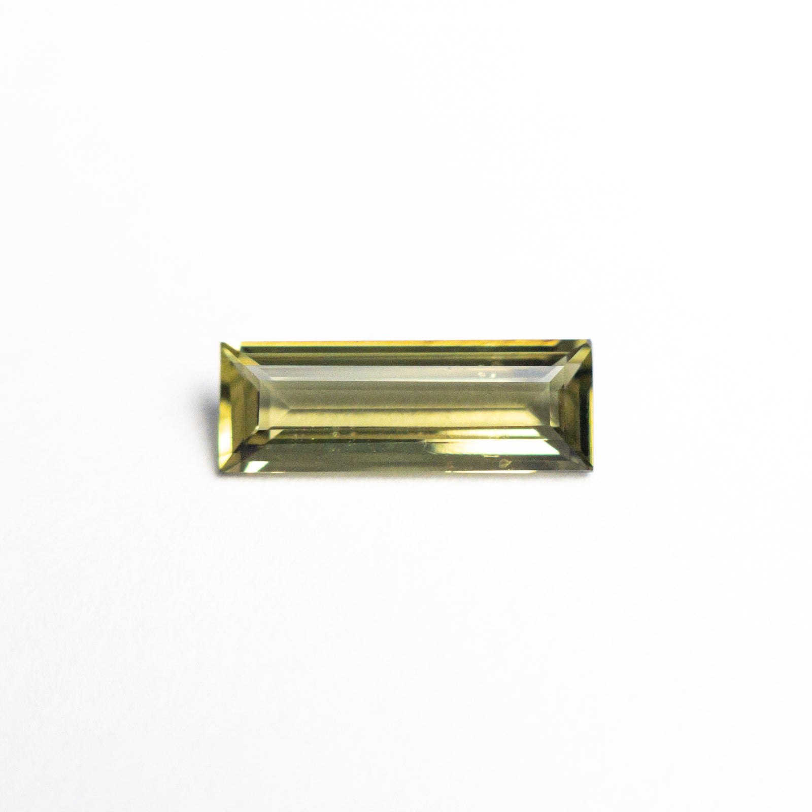 0.65ct 8.95x3.20x1.97mm Rectangle Step Cut Sapphire 25740-06