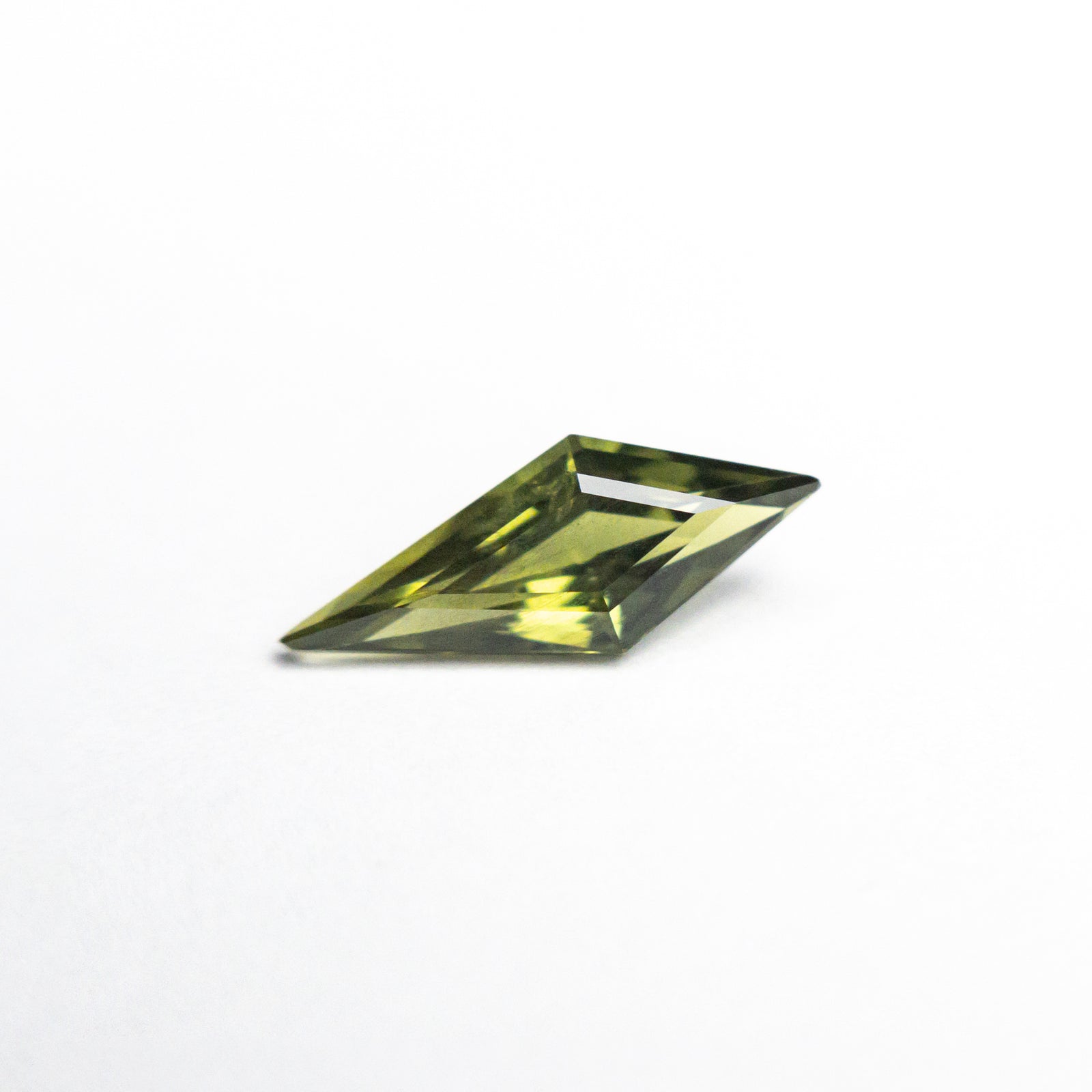 0.63ct 10.05x4.07x2.72mm Kite Step Cut Sapphire 25740-10