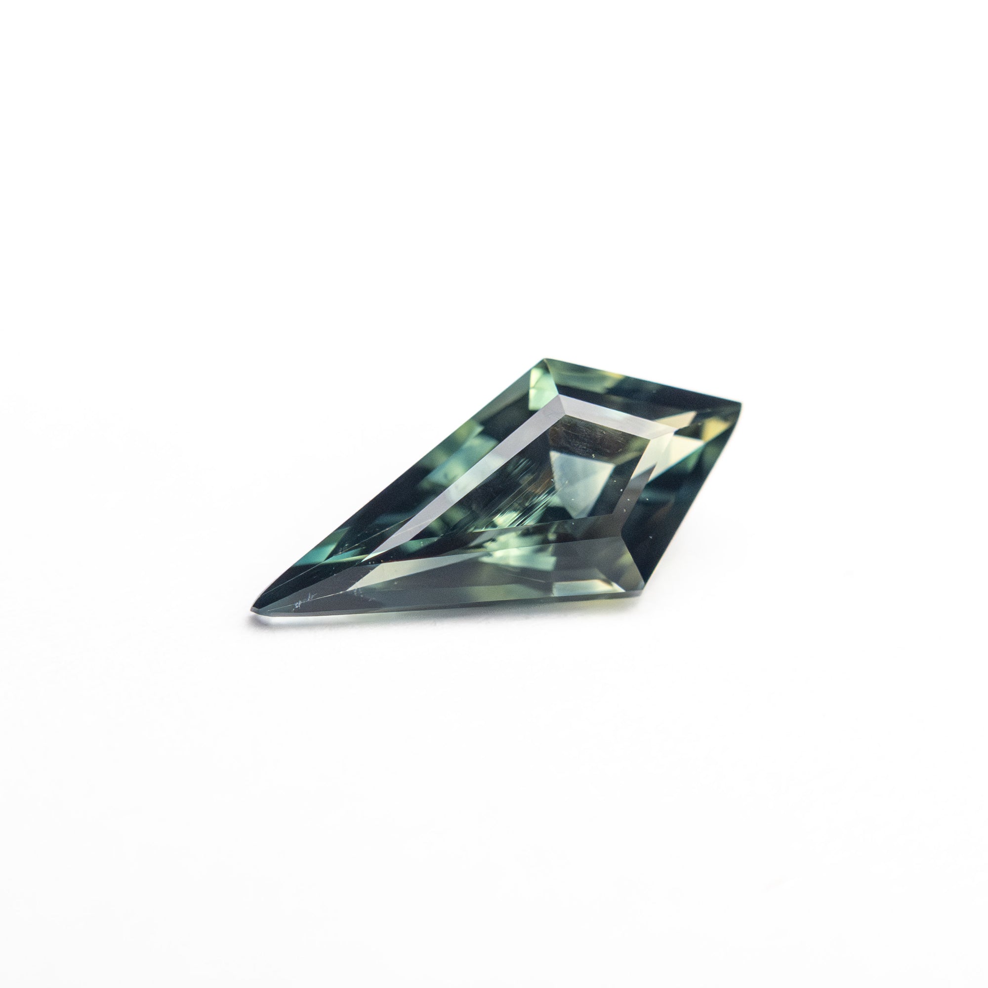 0.59ct 9.25x4.37x2.72mm Kite Step Cut Sapphire 25740-20