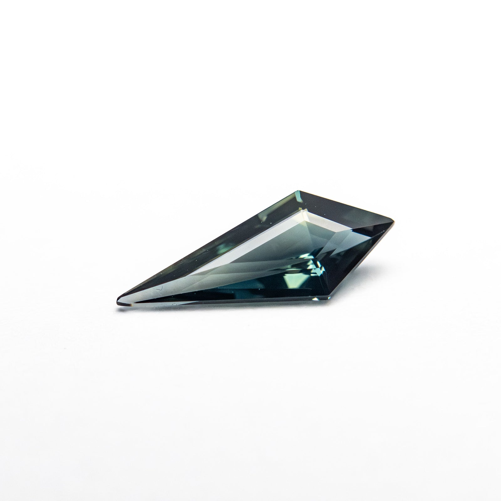 0.42ct 9.69x3.83x2.16mm Kite Step Cut Sapphire 25740-21
