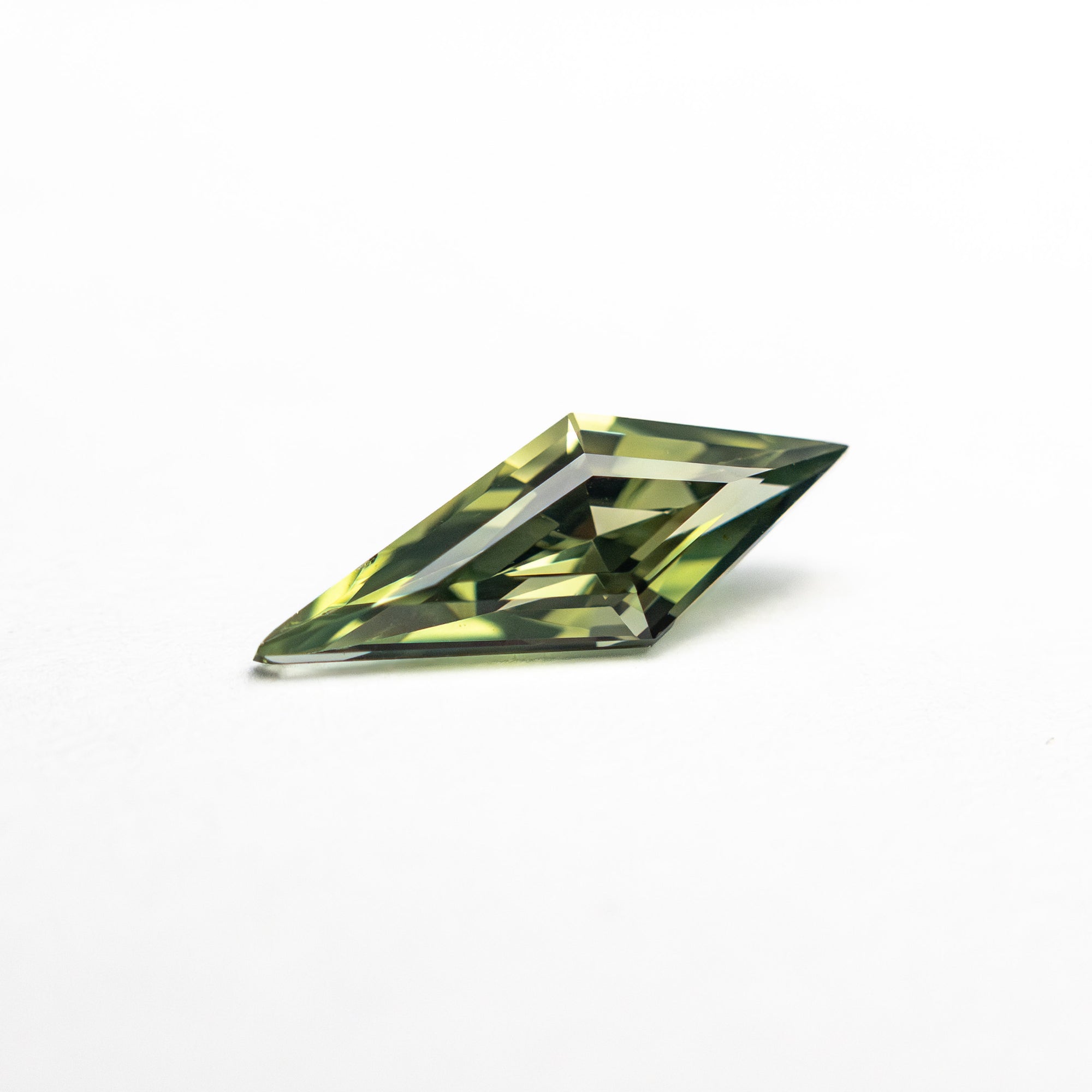 0.51ct 9.76x3.78x2.66mm Kite Step Cut Sapphire 25740-22