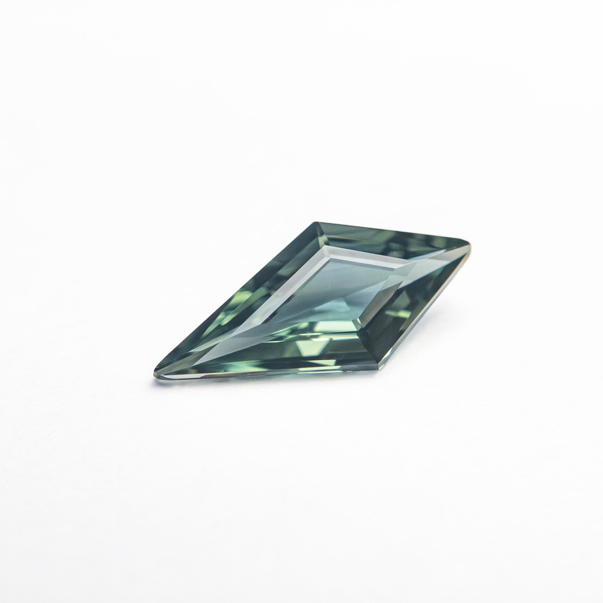 0.56ct 9.56x4.48x2.27mm Kite Step Cut Sapphire 25740-24